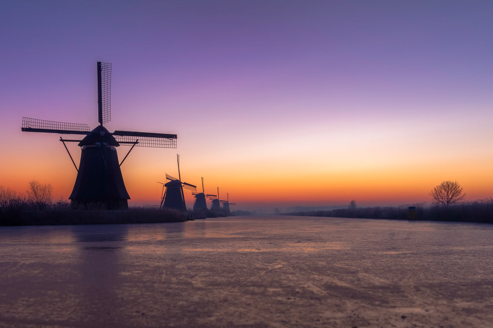 Sunrise at Kinderdijk. A well known spot that attracts plenty of photographers, but it's still a beautiful place to photograph. Even if we line up to take the same pictures ;).