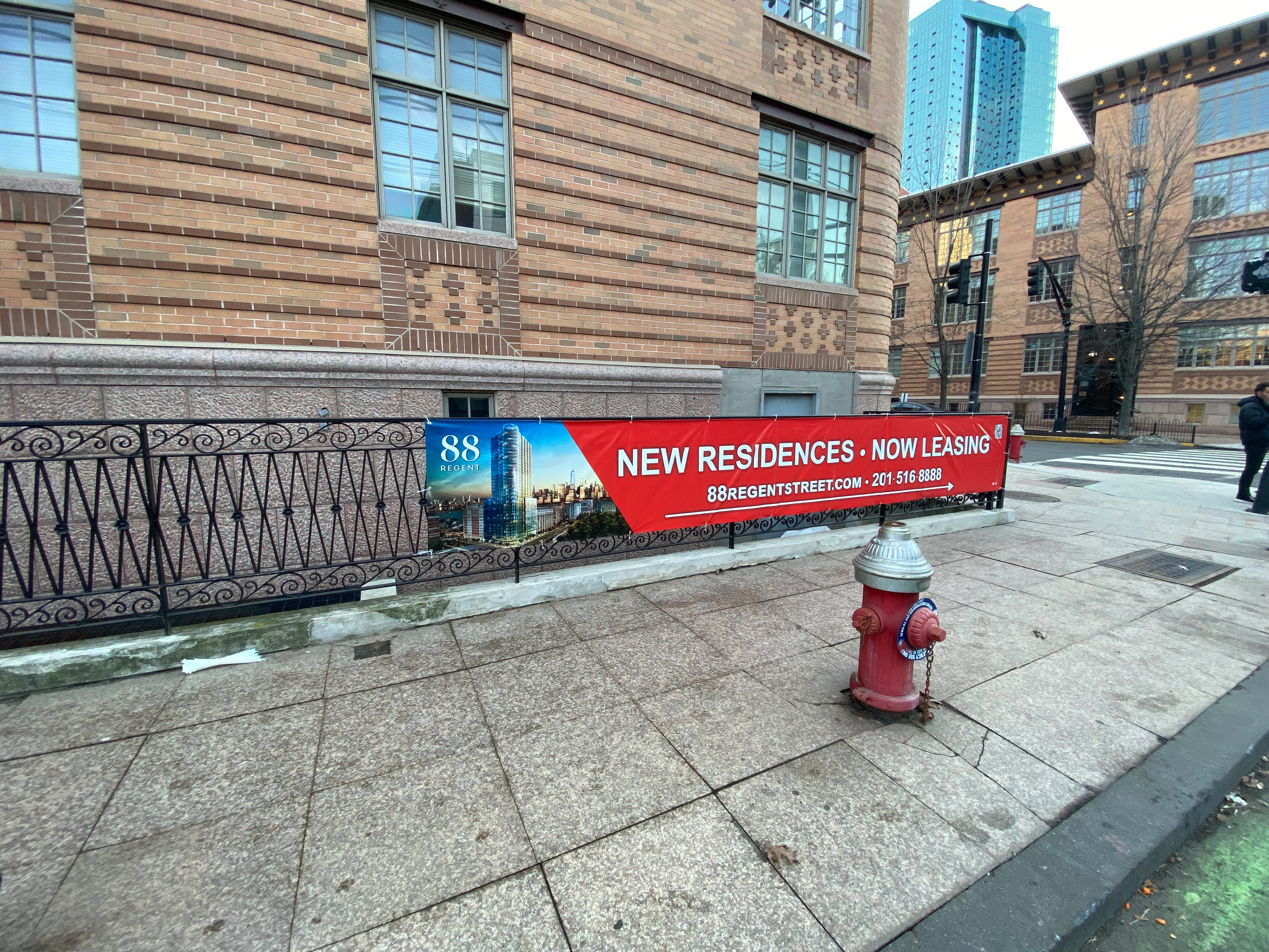 Designed, printed, grommeted and installed in-house promotional banner for 88 Regent Street of Liberty Harbor