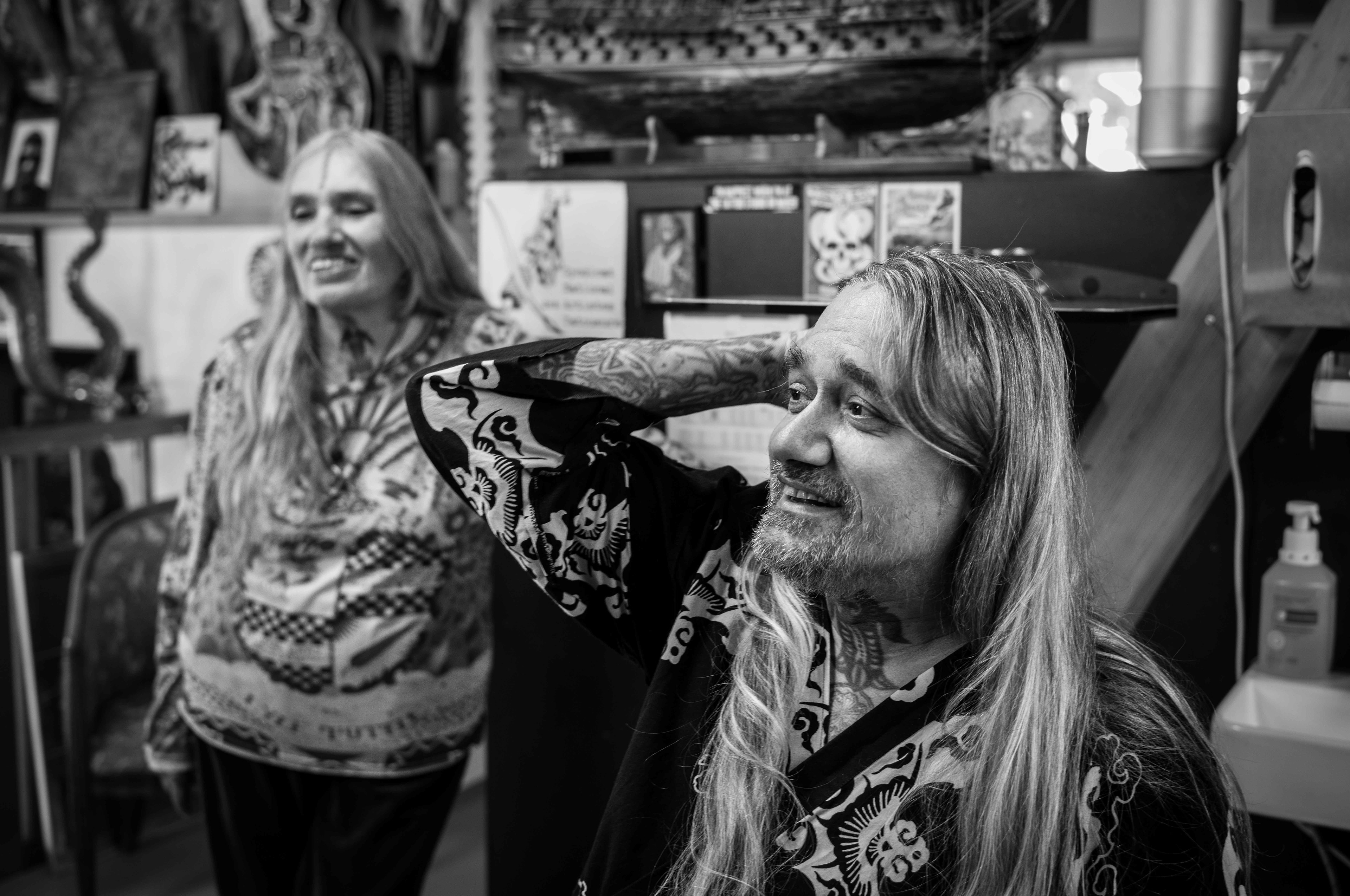Here, he is consulting with a client about her next tattoo session alongside his mother, Loretta Leu, to find out what ideas and wishes she has. Portrait of Filip Leu & Loretta Leu