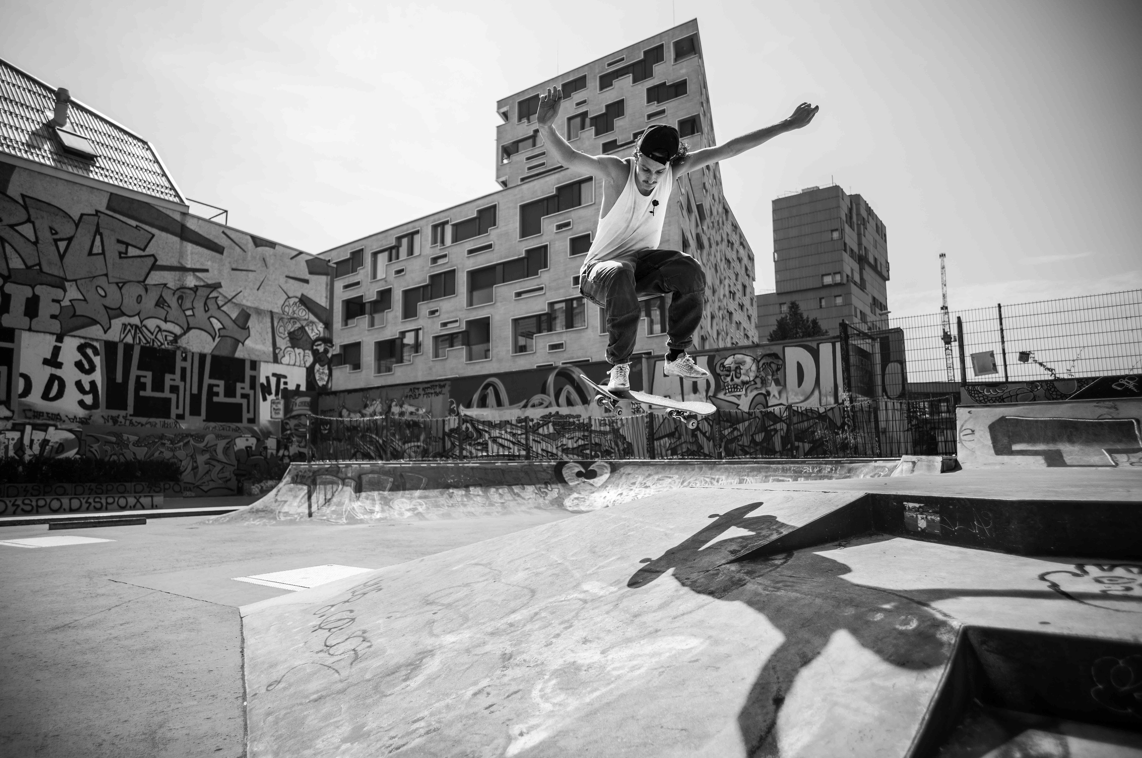 Skateboarder Curtis at Purple Park Basel, floating dynamically in mid-air with his skateboard for a fraction of a second. Photography by Carmine Castelli