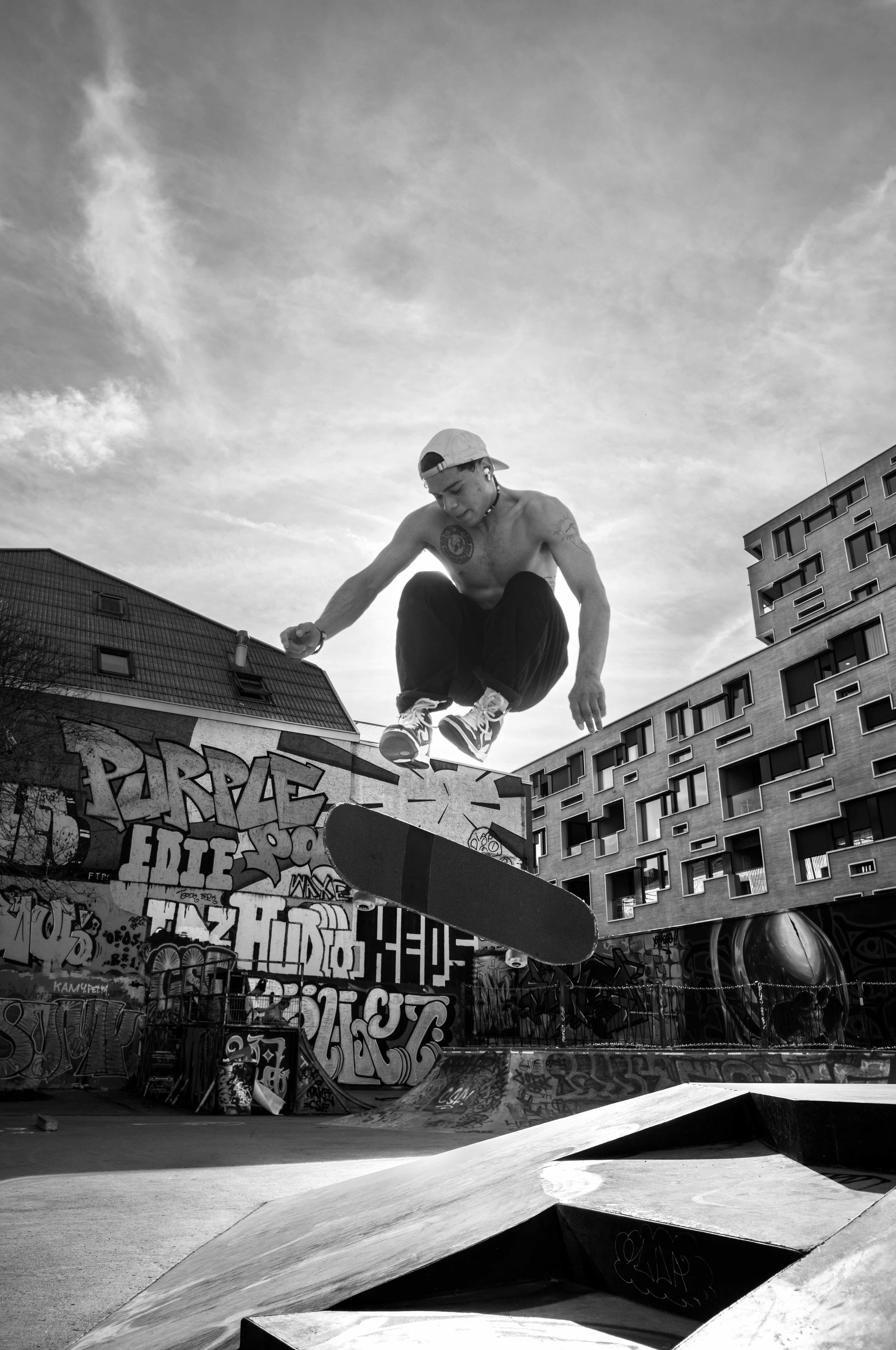 A fraction-of-a-second freeze of Ramirez floating above the concrete bowl at Purple Park Basel  by Carmine Castelli