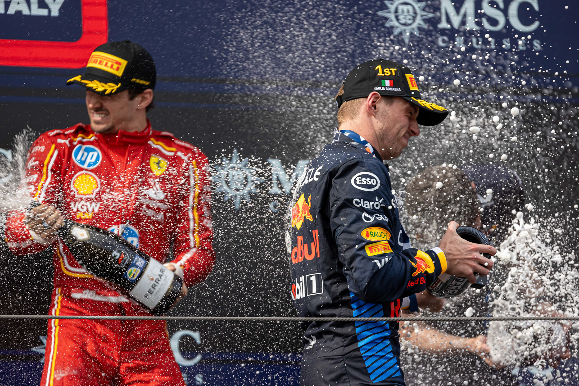 Charles Leclerc #16, Scuderia Ferrari und Max Verstappen #1, Oracle Red Bull Racing auf dem Podium.; F1 GP Imola / Italien Sonntag, 19.05.2024
