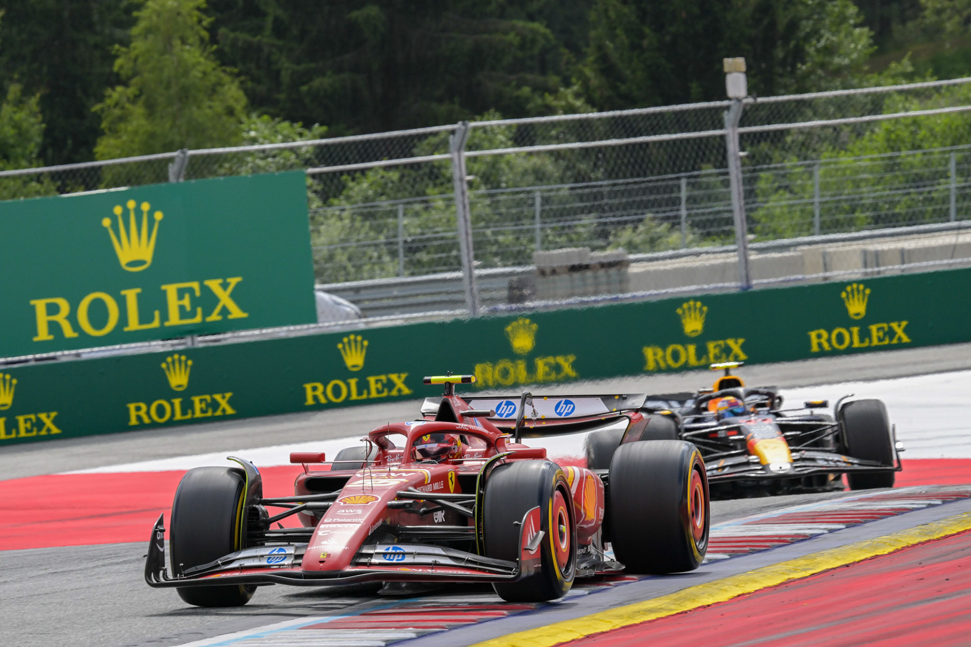 Carlos Sainz #55, Scuderia Ferrari und Sergio Perez #11, Oracle Red Bull Racing;Formel 1 GP Austria / Österreich. Sonntag, 30.06.2024