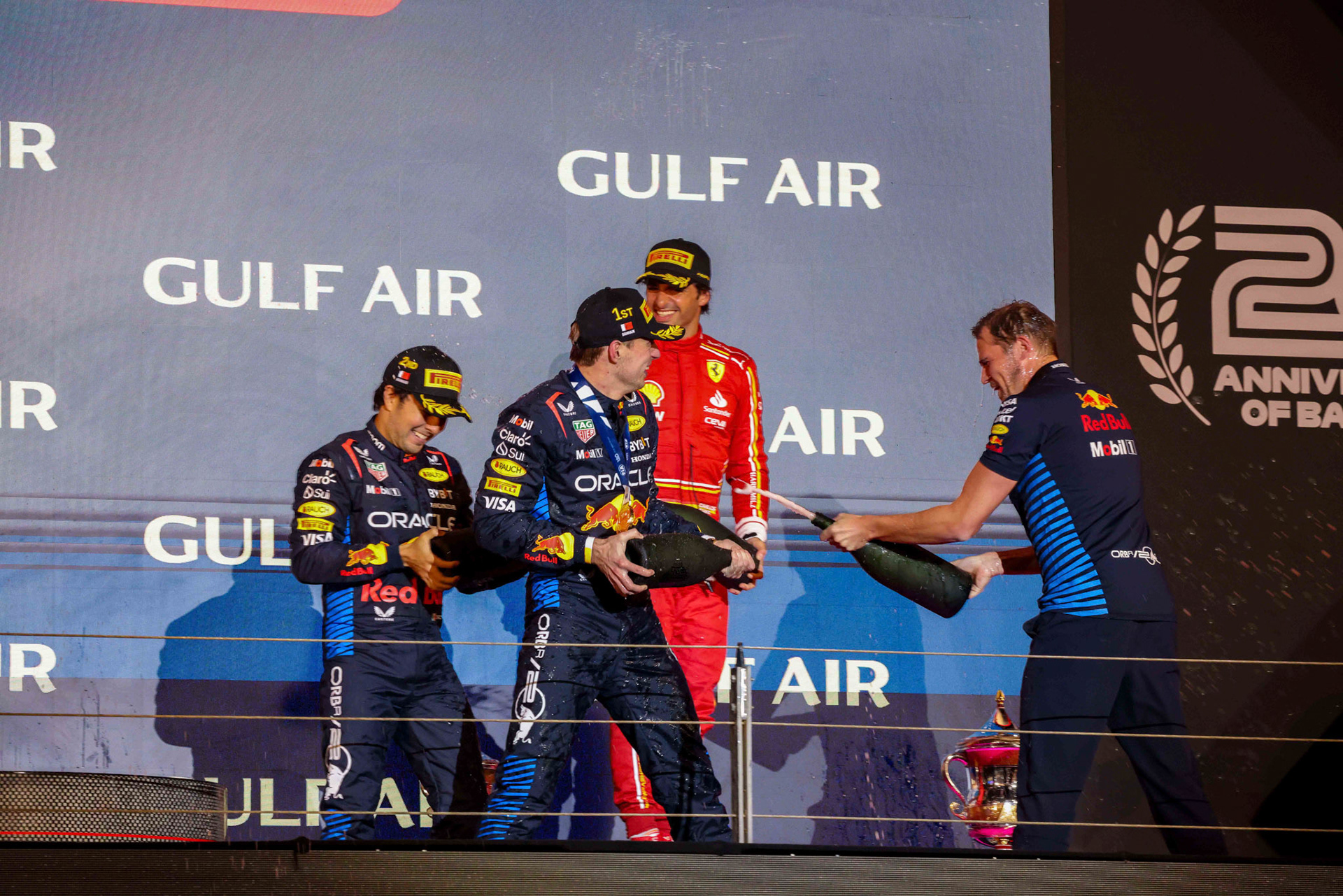 Podium in Bahrian mit: Sergio Perez #11, Oracle Red Bull Racing, Max Verstappen #1, Oracle Red Bull Racing, Carlos Sainz #55, Scuderia Ferrari; Formel 1 GP Bahrain. Samstag 02.03.2024