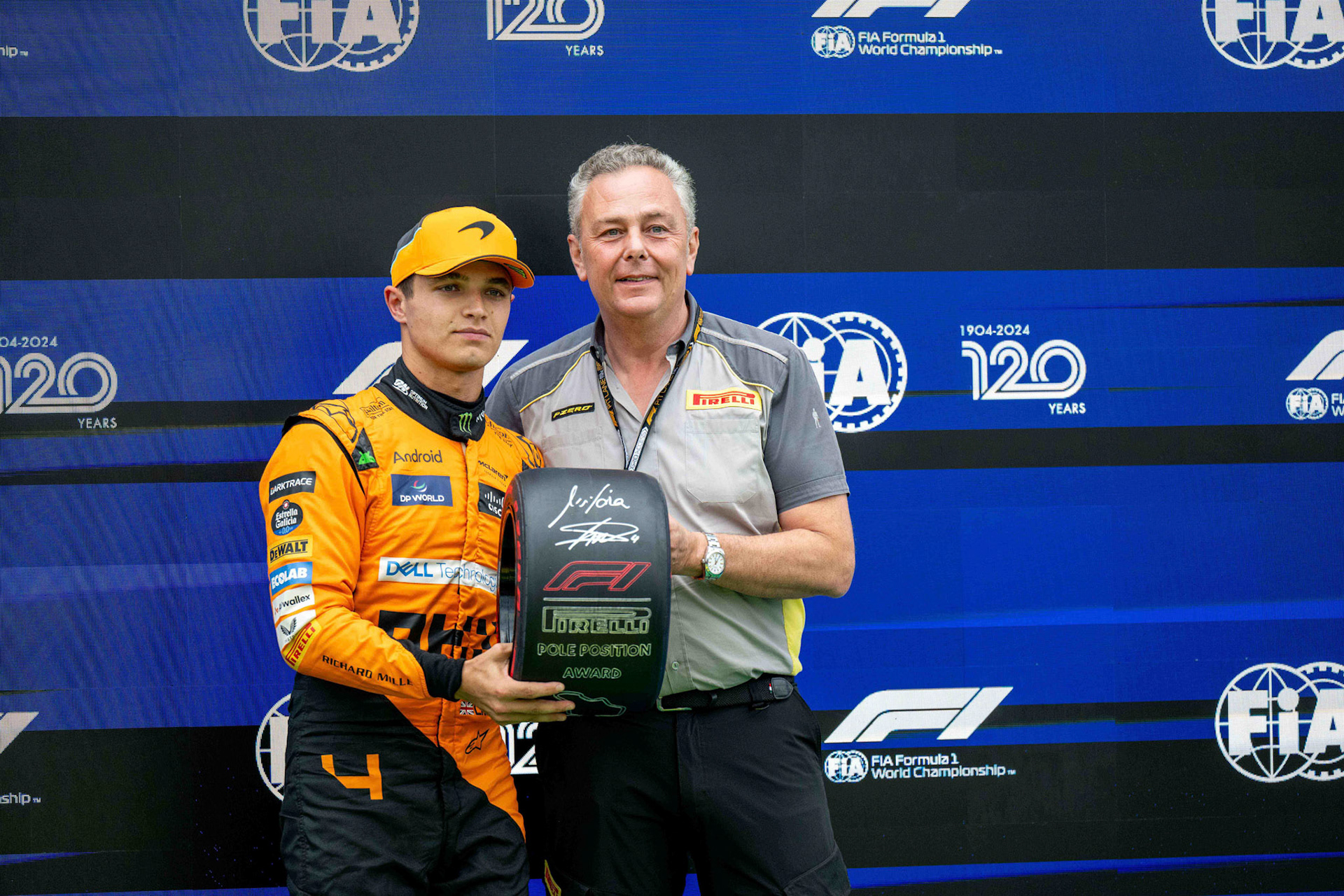 Lando Norris #4, McLaren Formula 1 Team und Mario Isola, Pirelli Motorsportchef;Formel 1 Budapest / Ungarn, 20.07.2024