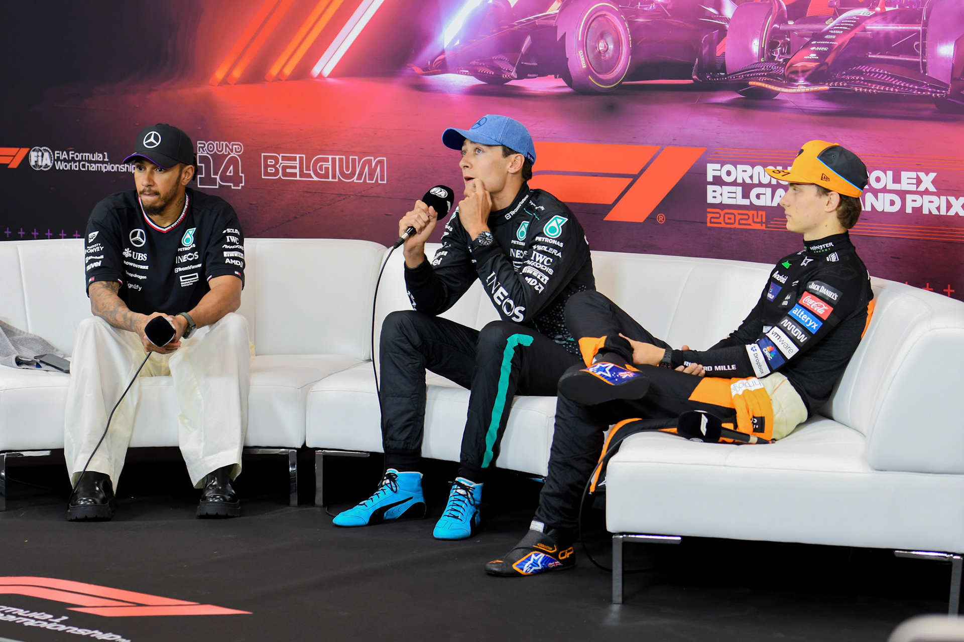 Lewis Hamilton #44, Mercedes-AMG Petronas F1 Team und George Russell #63, Mercedes-AMG Petronas F1 Team und Oscar Piastri #81, McLaren Formula 1 Team in der Pressekonferenz;Formel 1 GP Spa / Belgien. Sonntag, 28.07.2024