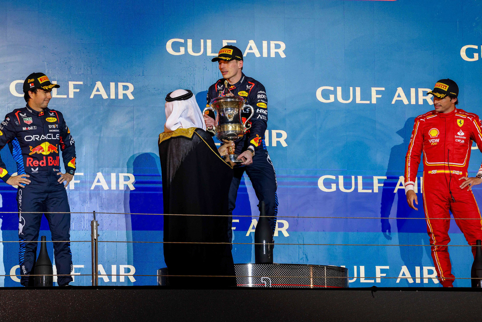 Podium in Bahrian mit: Sergio Perez #11, Oracle Red Bull Racing, Max Verstappen #1, Oracle Red Bull Racing, Carlos Sainz #55, Scuderia Ferrari; Formel 1 GP Bahrain. Samstag 02.03.2024