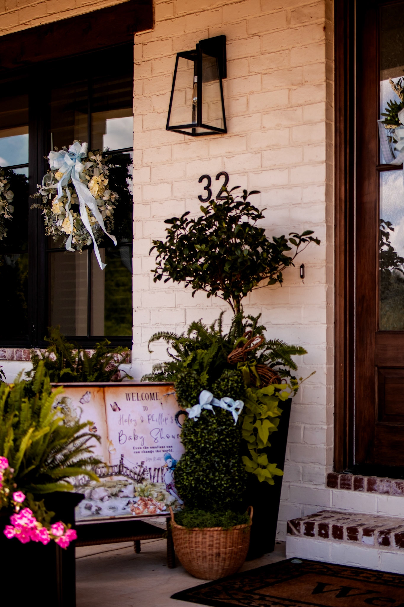 Little Rock baby shower photography showing a beautifully styled welcome sign and front porch entrance.