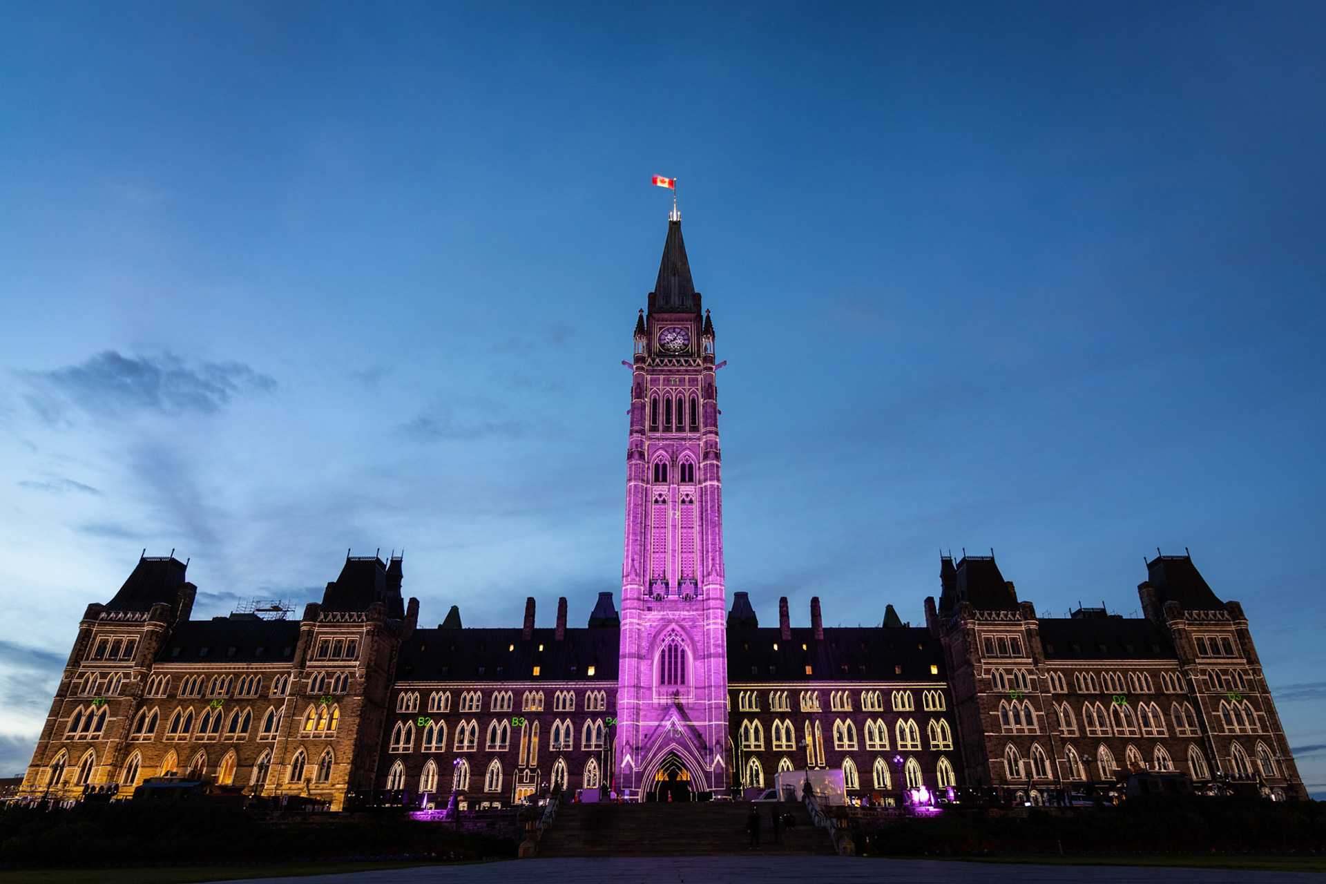 Nothern lights show at Parliment Builing in Ottawa, Canada at sunset