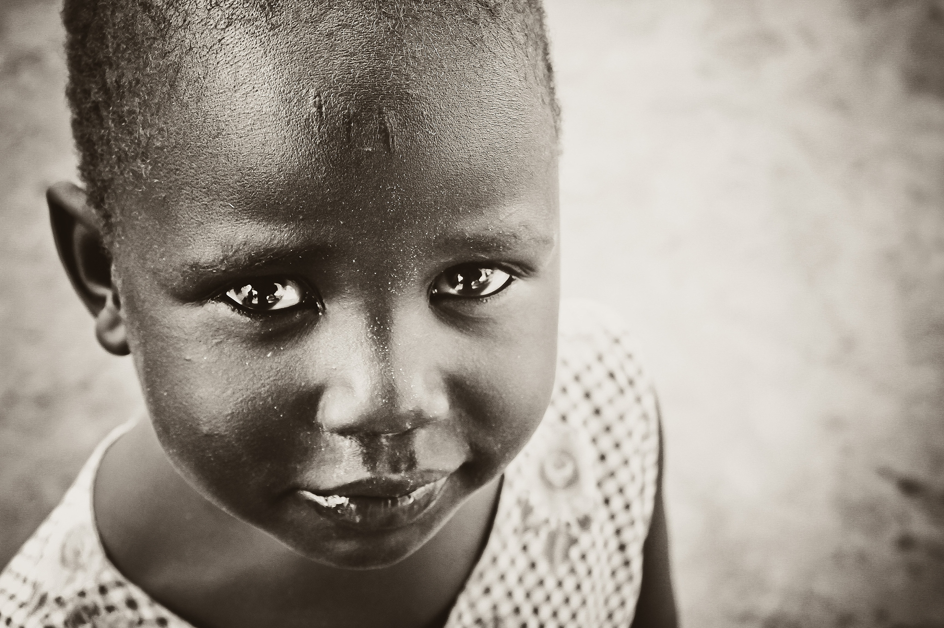 Imani poses for a photo in Yei, South Sudan on Sunday, Oct. 9, 2011. She lives in a children’s village with 120 children outside the town of Yei.