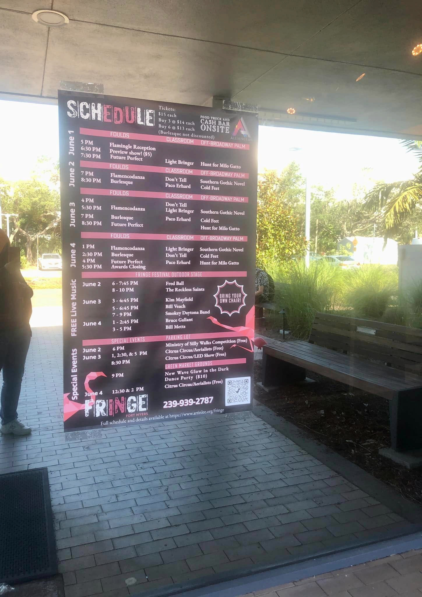 A large poster of a schedule for Fringe Fort Myers that listed every event over four days and three venues with over 20 performers.