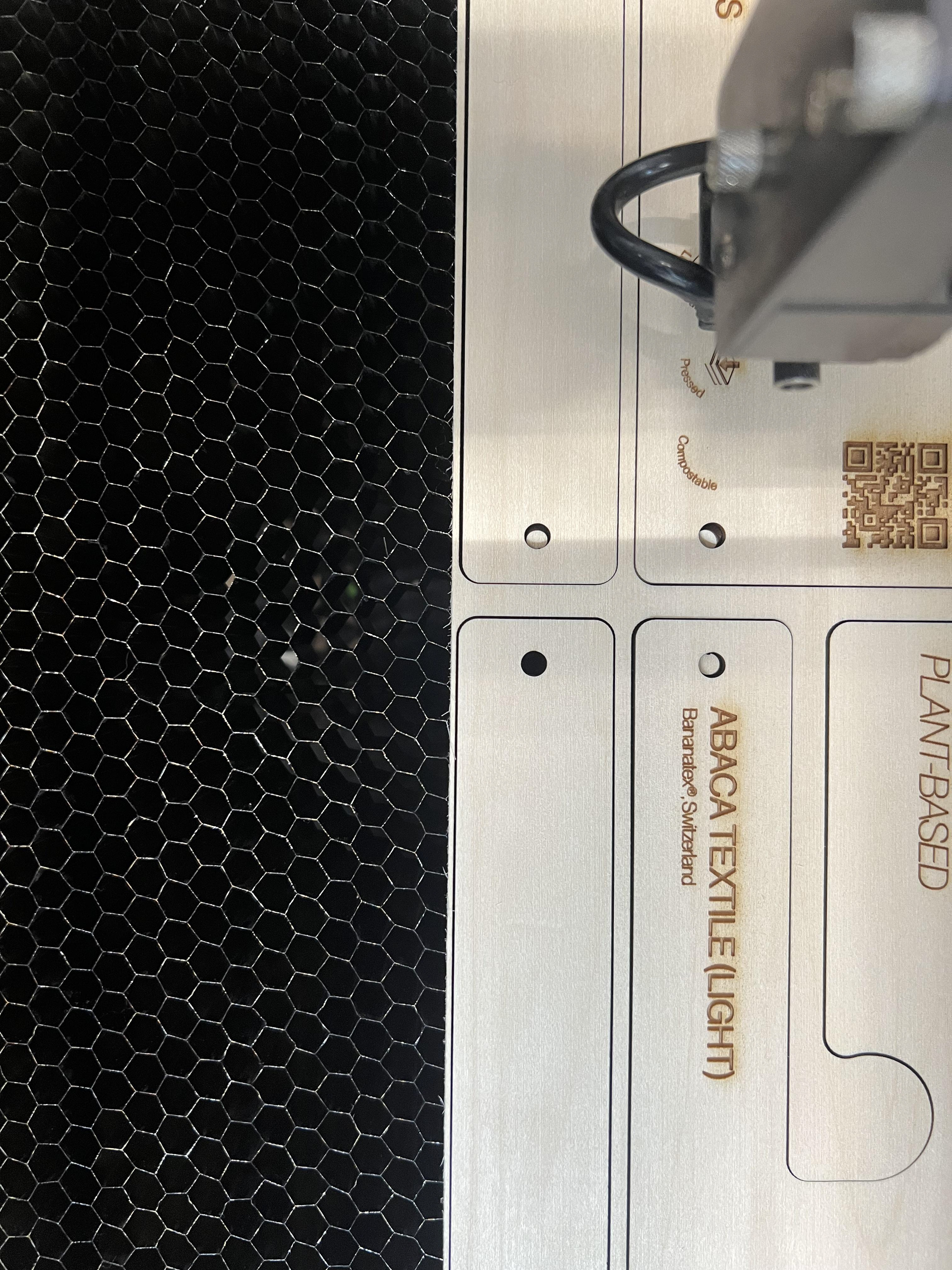 Laser cutting labels onto wood