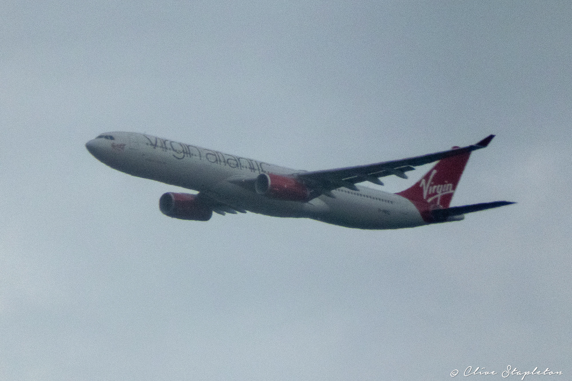 A Virgin Atlantic  A330 flying away from Heathrow Airport