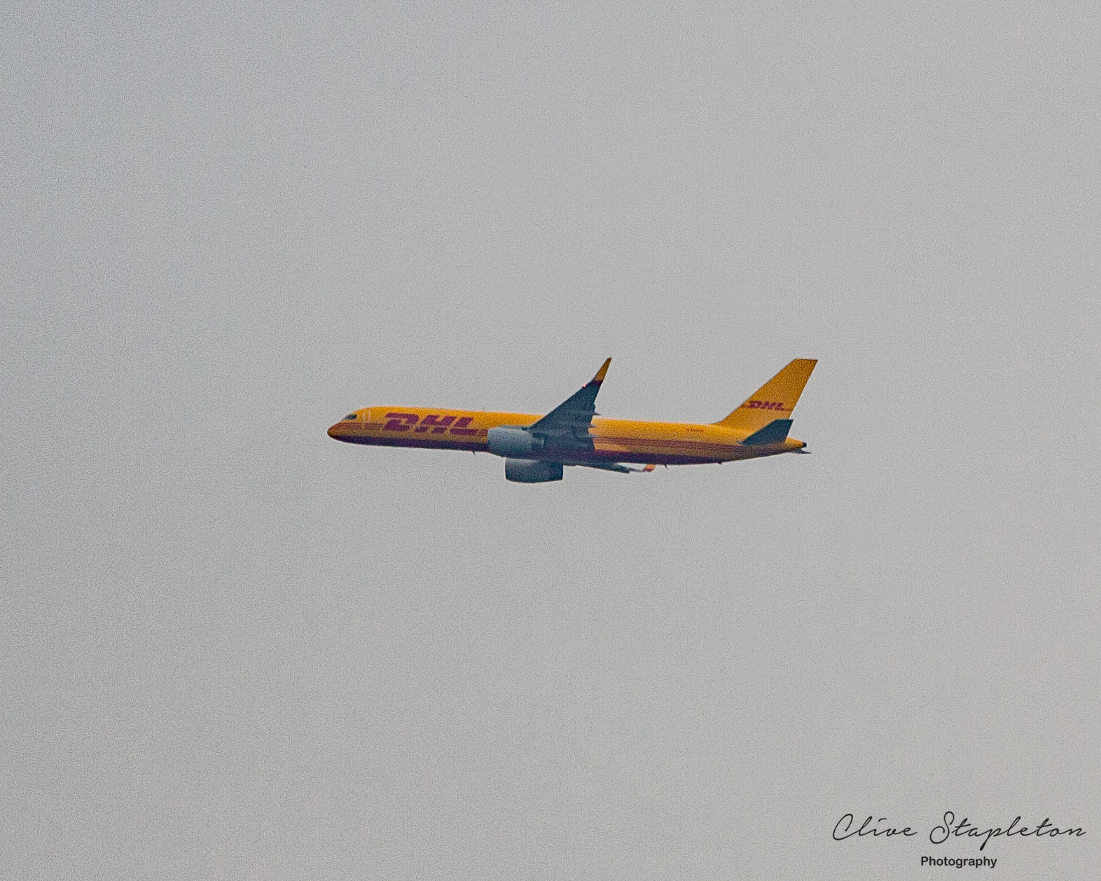 Willington, Derby, UK, April,1,2021:European Air Transport Boeing 757-200 Flight BCS846 Brussels to East Midlands Airport on the approach to East Midlands Airport over Willington Derbyshire.