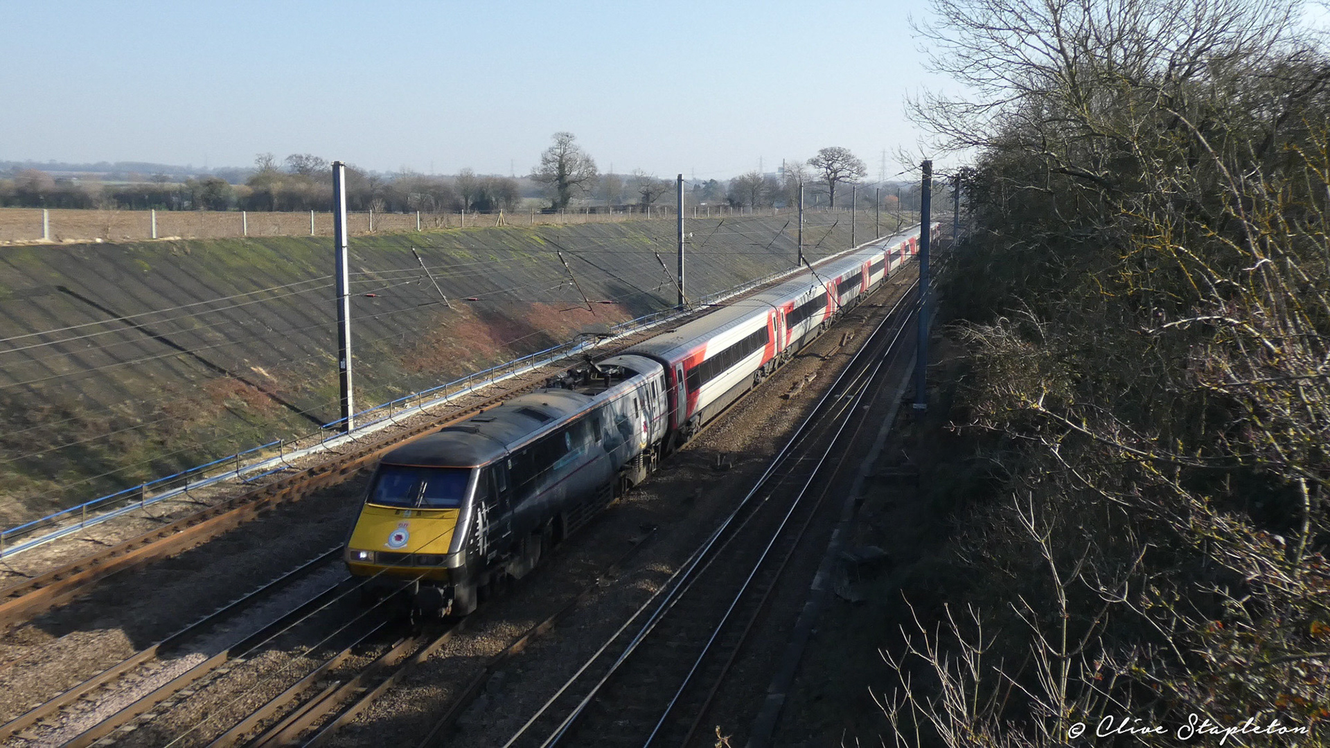 A Class 91 named Battle of Britain Memorial Flight heading north on a express near Stevenage.