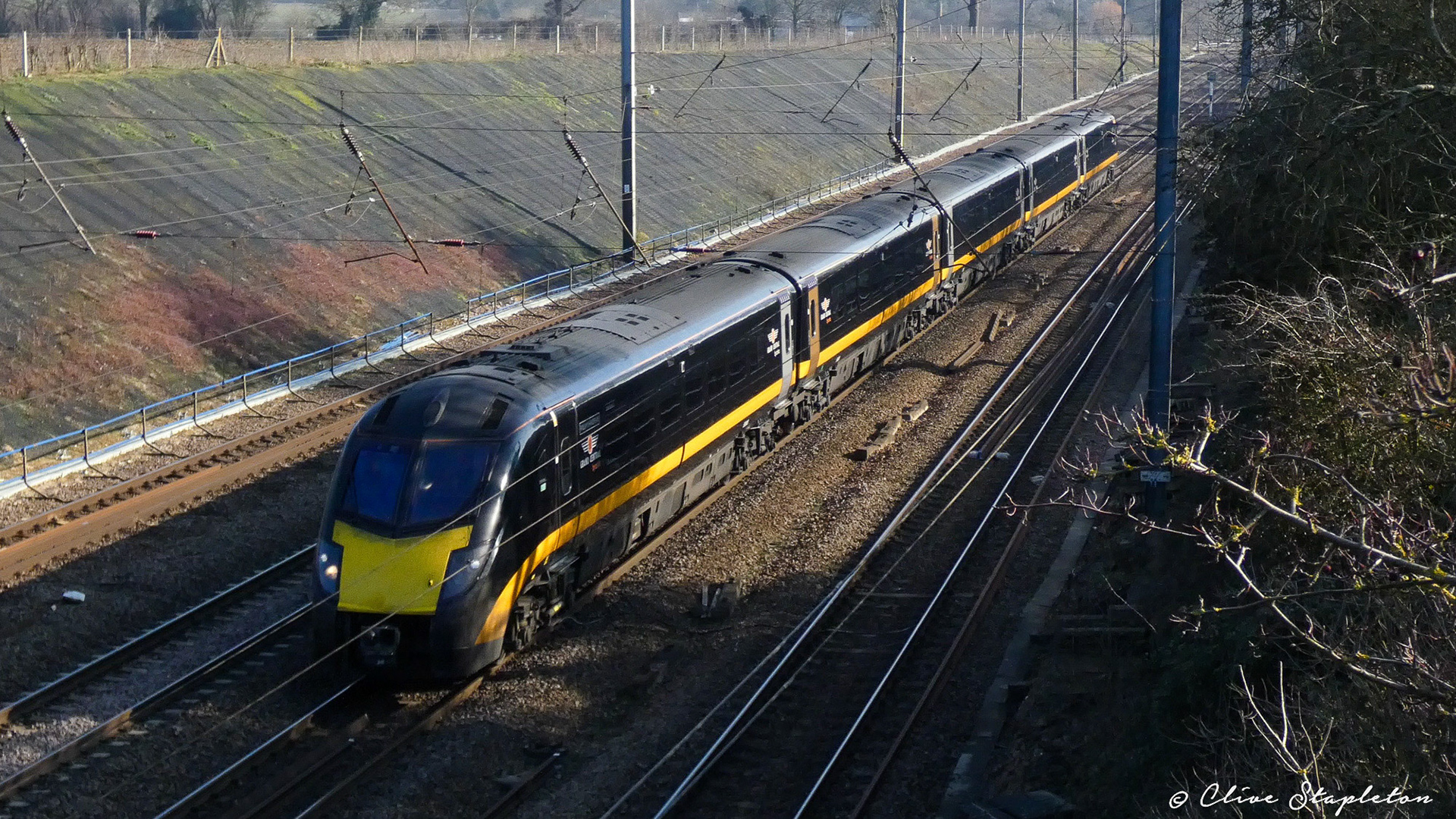 A Grand Central Class 180 On a London Kings Cross to Sunderland near Stevenage.