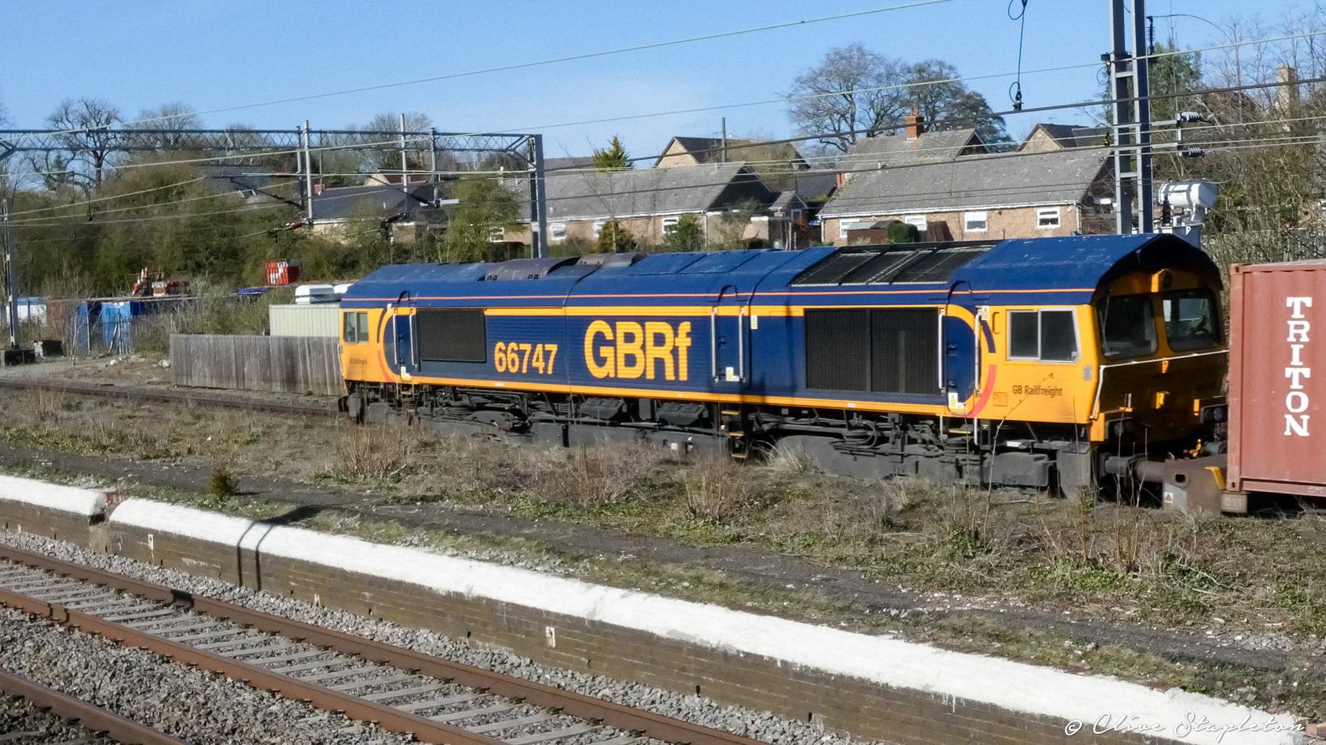 A class 66 heads through the disused Castlethorpe Station