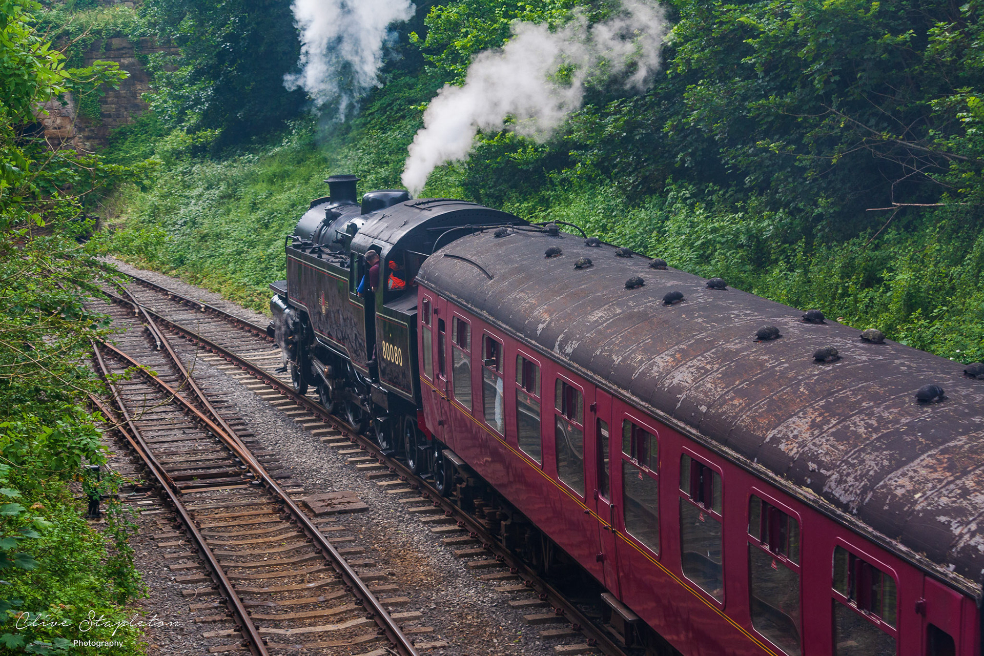 Ecclesbourne Valley Railway Steam Locomotive 80080 on a service to Wirksworth departing from Duffield.