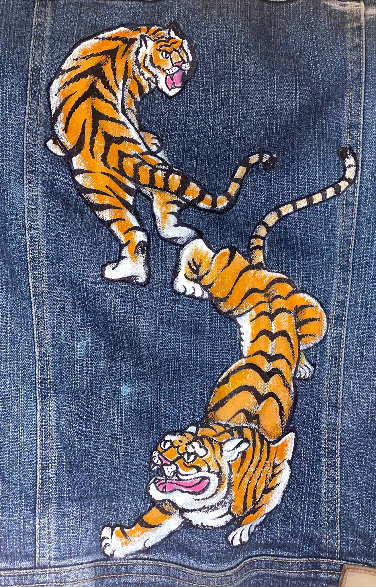 Acrylic paint on denim.