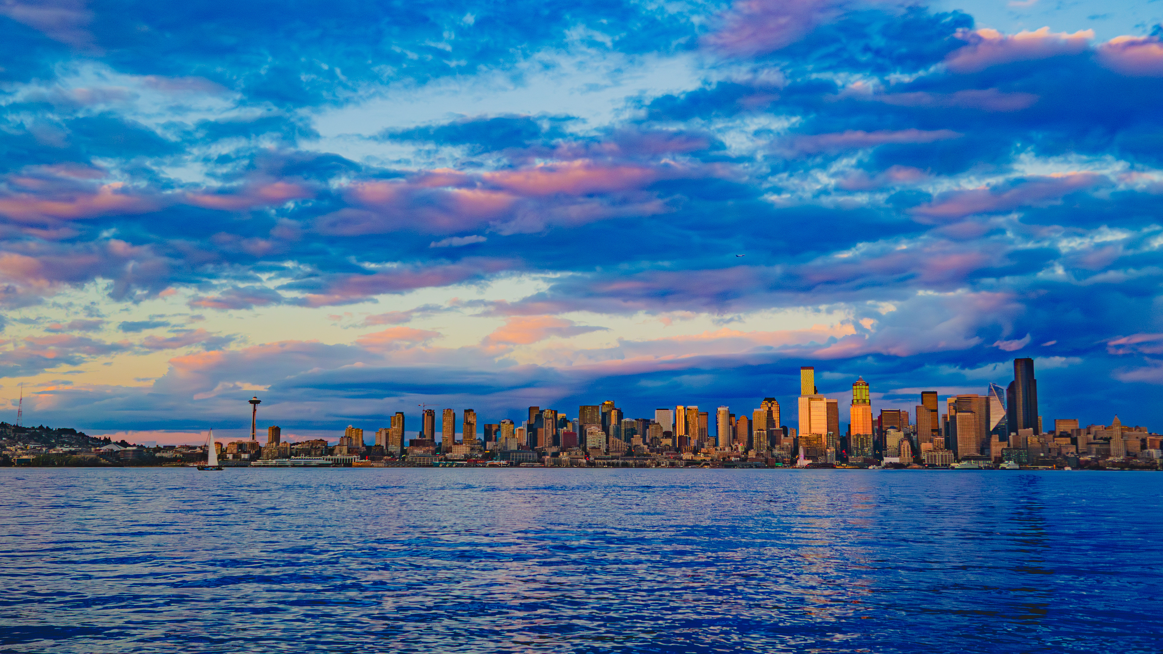 August 2026 - Seacrest Dock (West Seattle Water Taxi Dock) at showcasing a beautiful Seattle cityscape sunset.