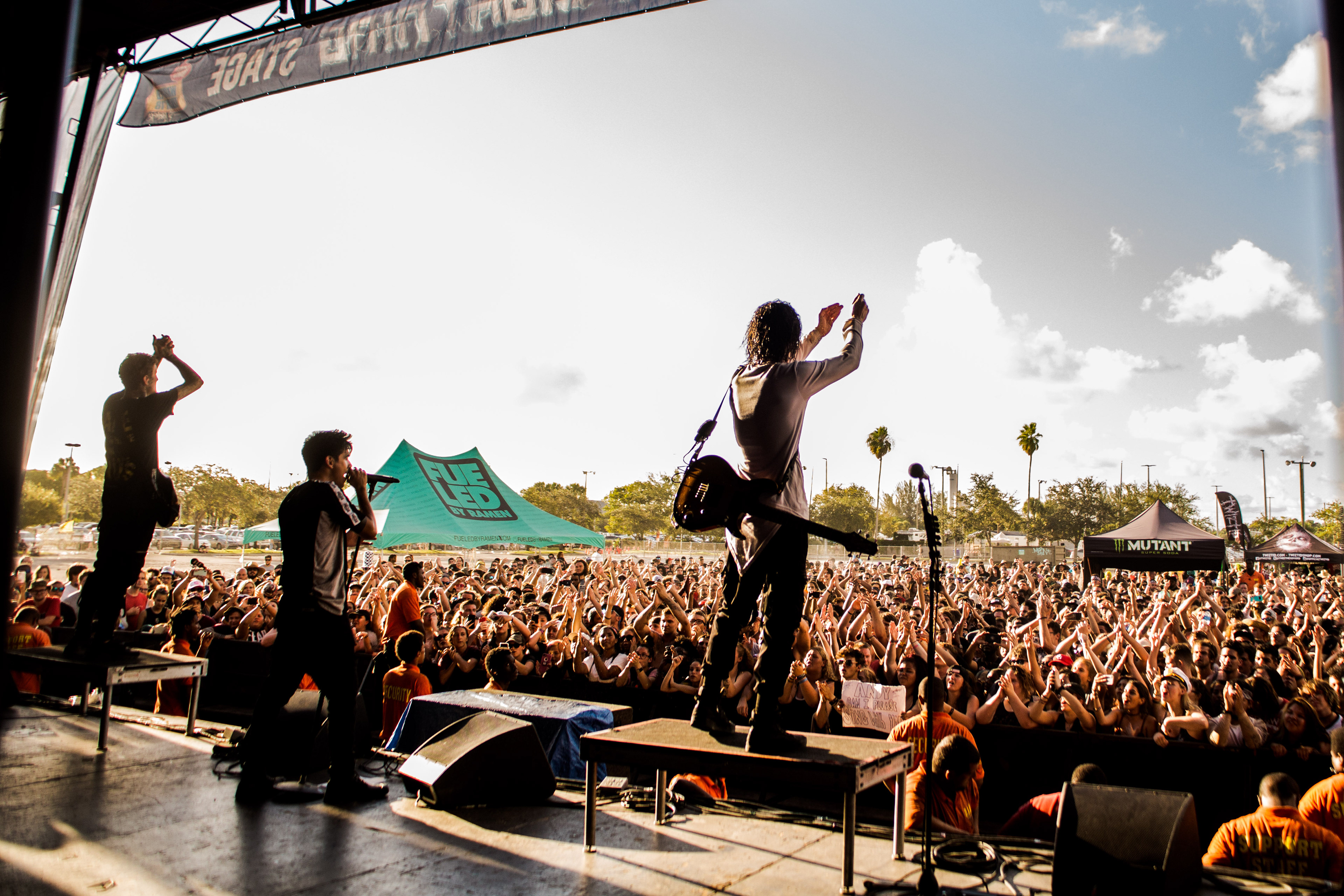 August 2018 - Golden hour at the final Warped Tour. Crown The Empire performing a high-energy set in West Palm Beach, utilized the natural Florida sunset to frame the end of an era.