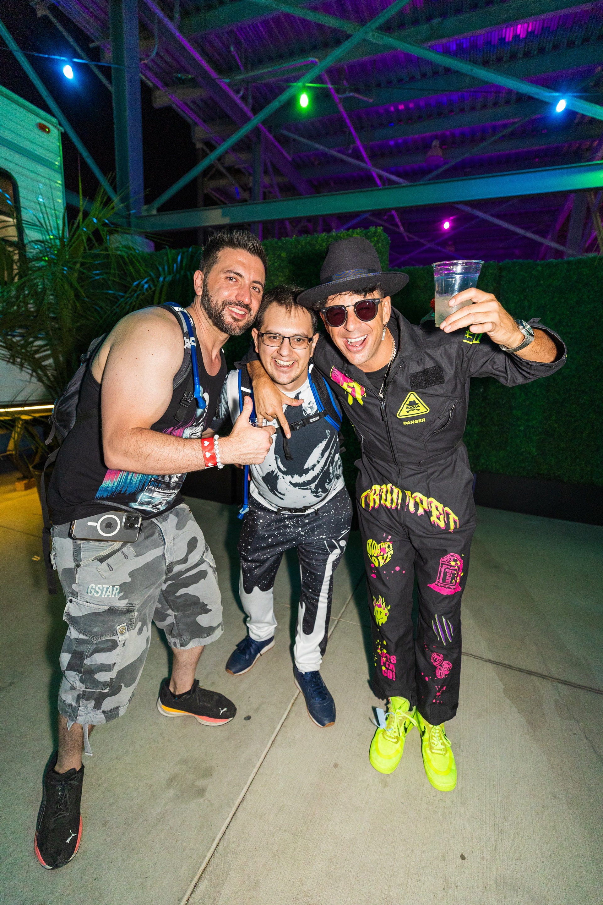 Capturing the moment between a charity auction winner and artist Timmy Trumpet backstage at the Las Vegas Motor Speedway.