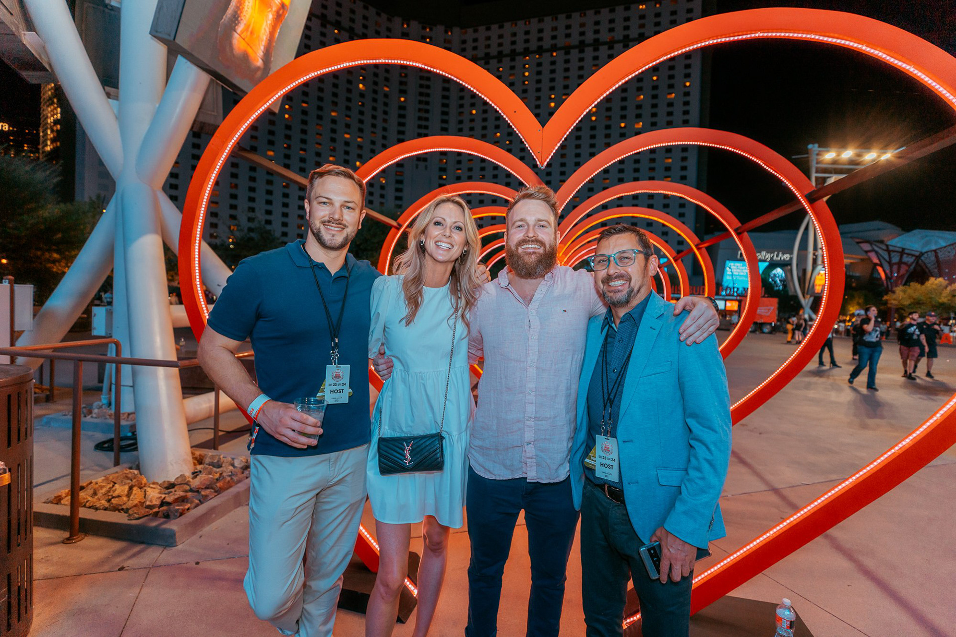 iHeartRadio hosts and guests at the leading heart structure activation, emphasizing the 'Red Carpet' experience of the festival.