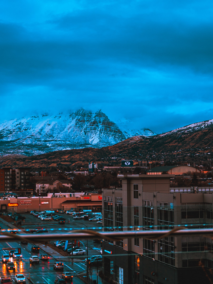 February 2025 - Utah mountain view and the city skyline at dusk of Provo, Utah from the Utah Valley Convention Center. Photo: Savannah Lee Rowley