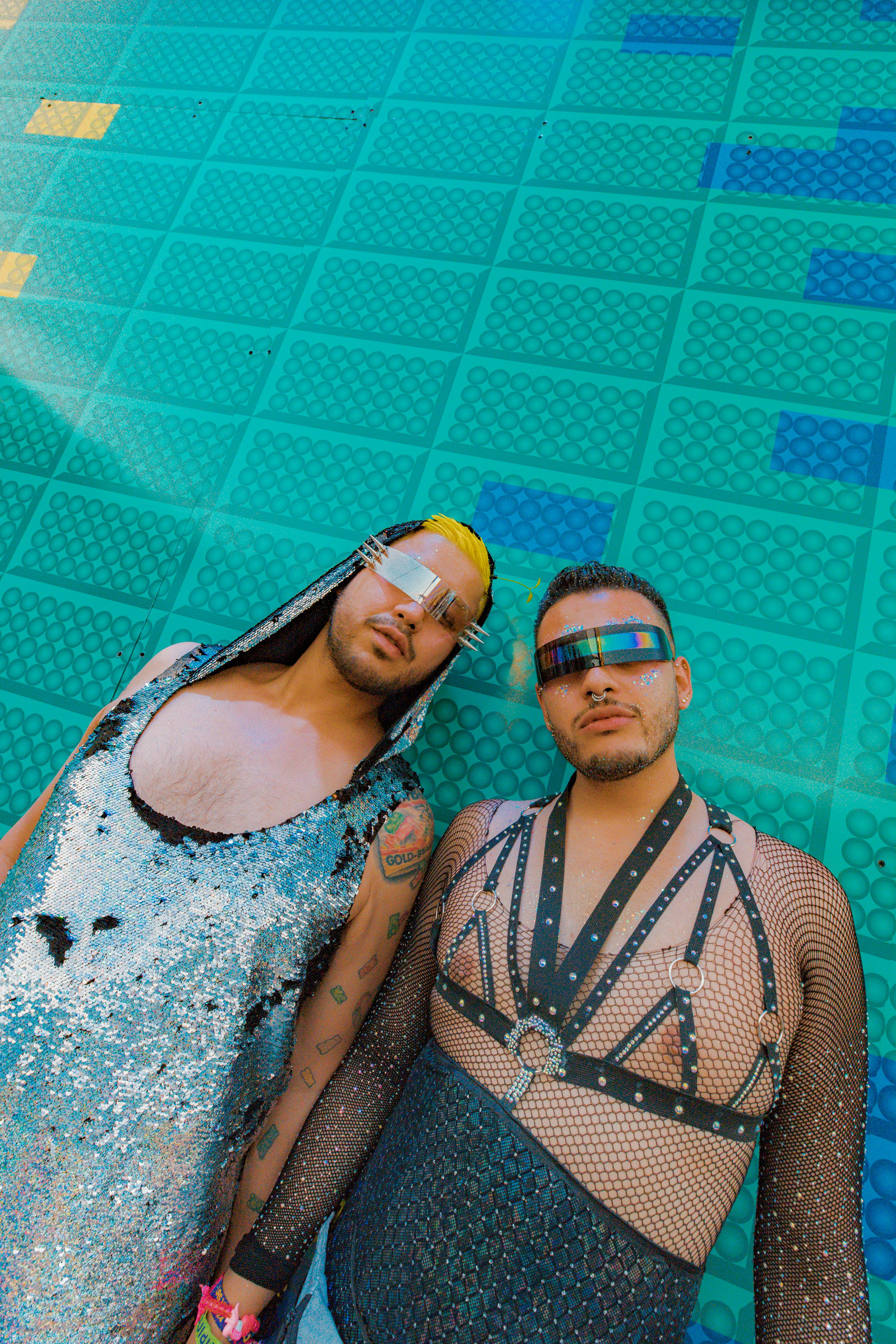 EDC Las Vegas attendees in curated fashion. This portrait study utilizes the vibrant textures of the festival grounds to create a clean, editorial aesthetic.