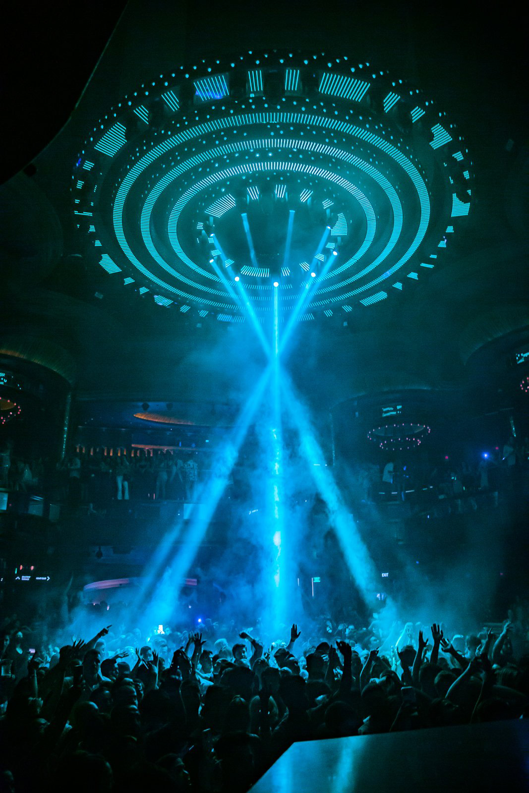 June 2022 - A sea of nightclub attendees under the alien-like strobe lights of Omnia Nightclub in Las Vegas, Nevada.