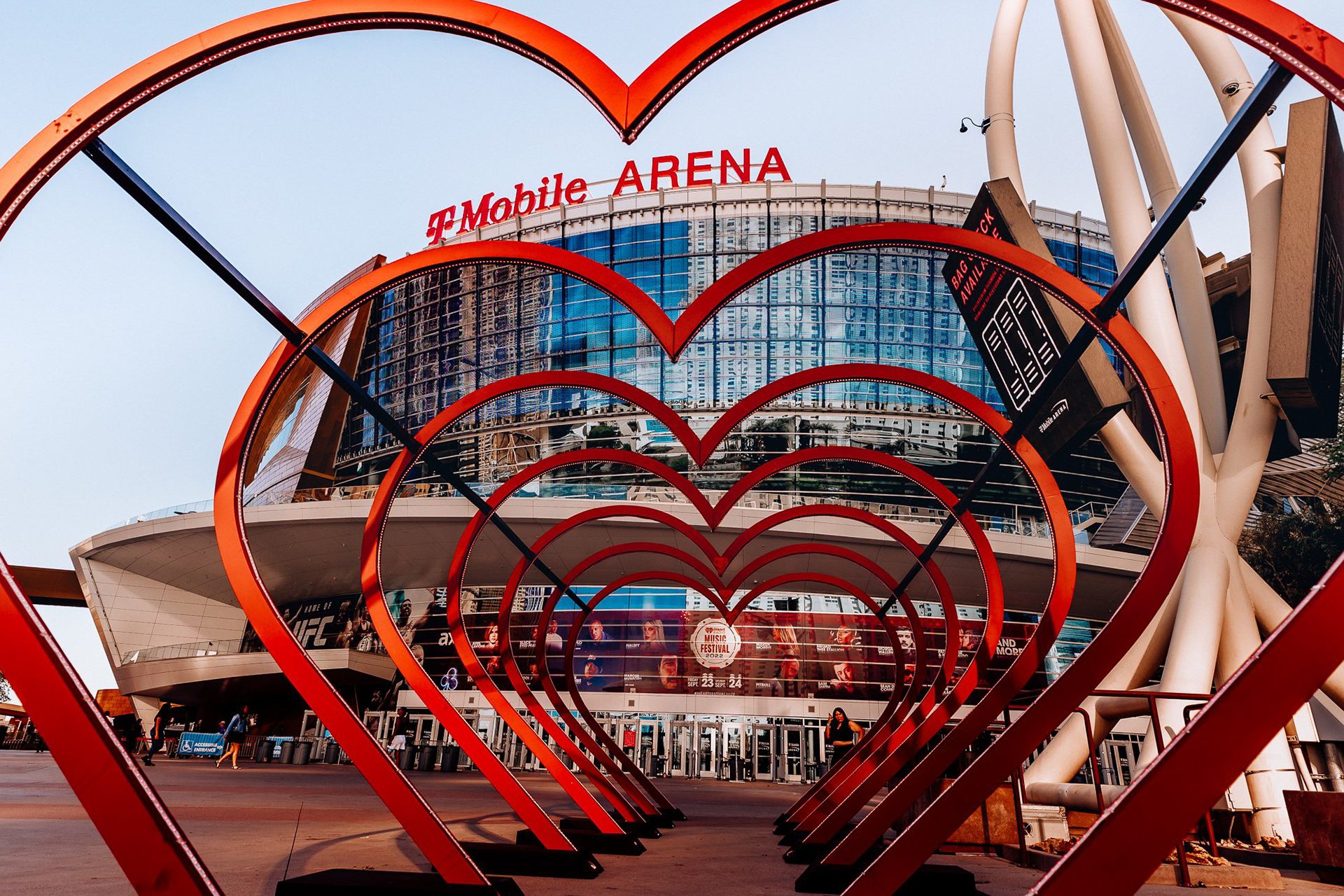 Experiential brand entry: The iconic iHeartRadio heart photo activation leading into the T-Mobile Arena entrance.