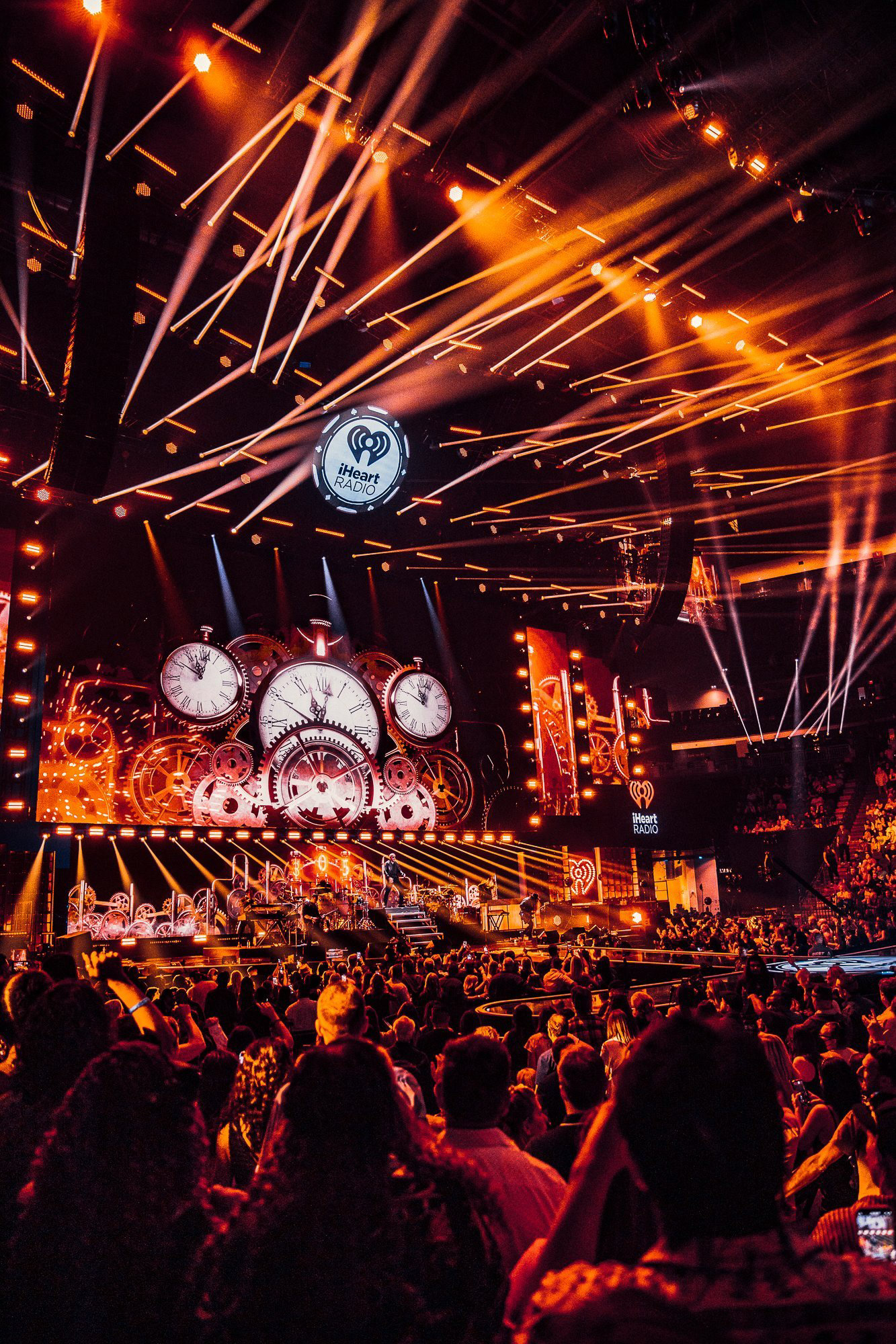 Pitbull performing 'Timber' at the iHeartRadio Music Festival. Documenting the vibrant neon production and custom stage visuals.