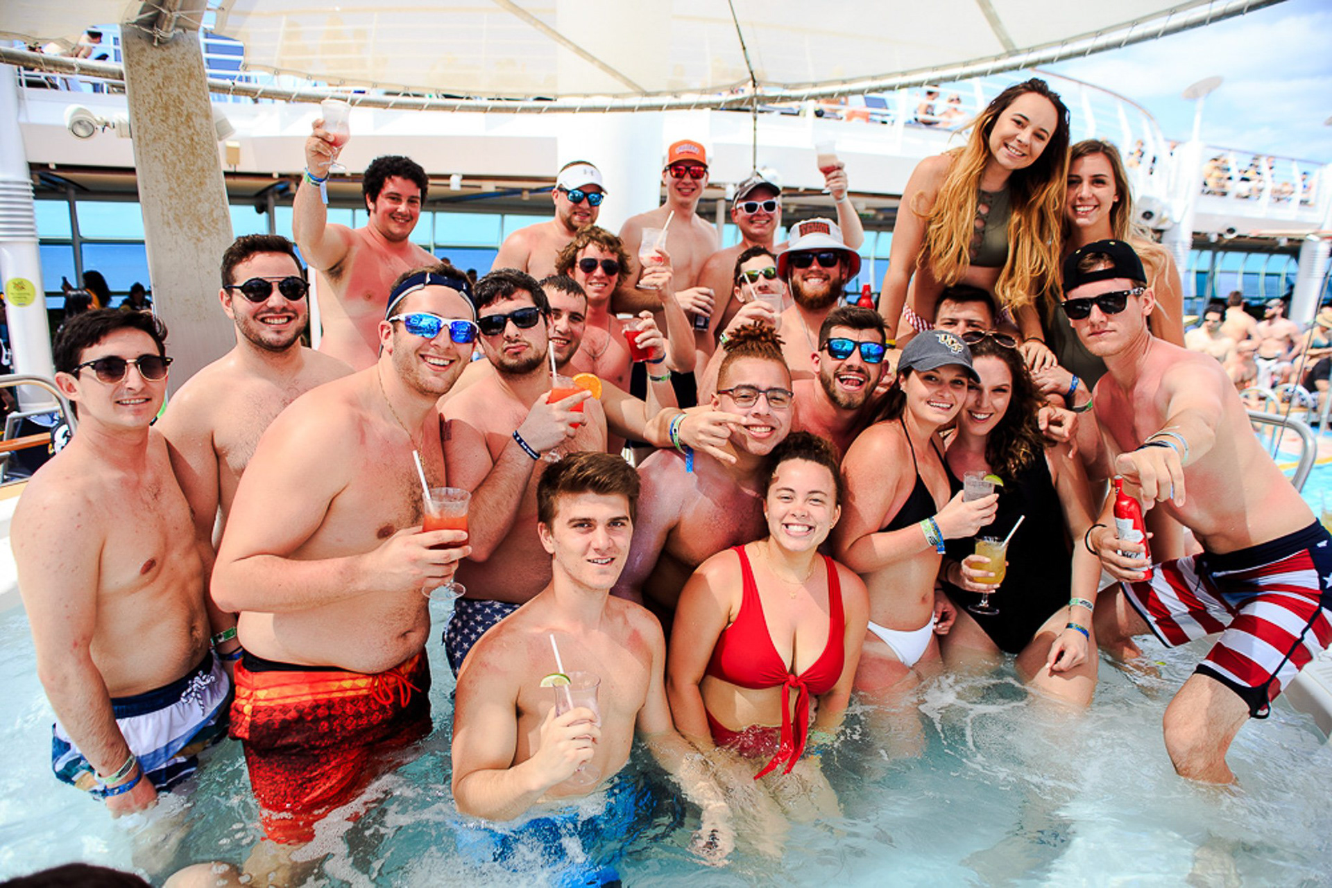 Guests enjoying the 'Mariner of the Seas' amenities. Capturing the authentic 'Sea Day' experience for the College Party Cruise on-board Spring Break experience.