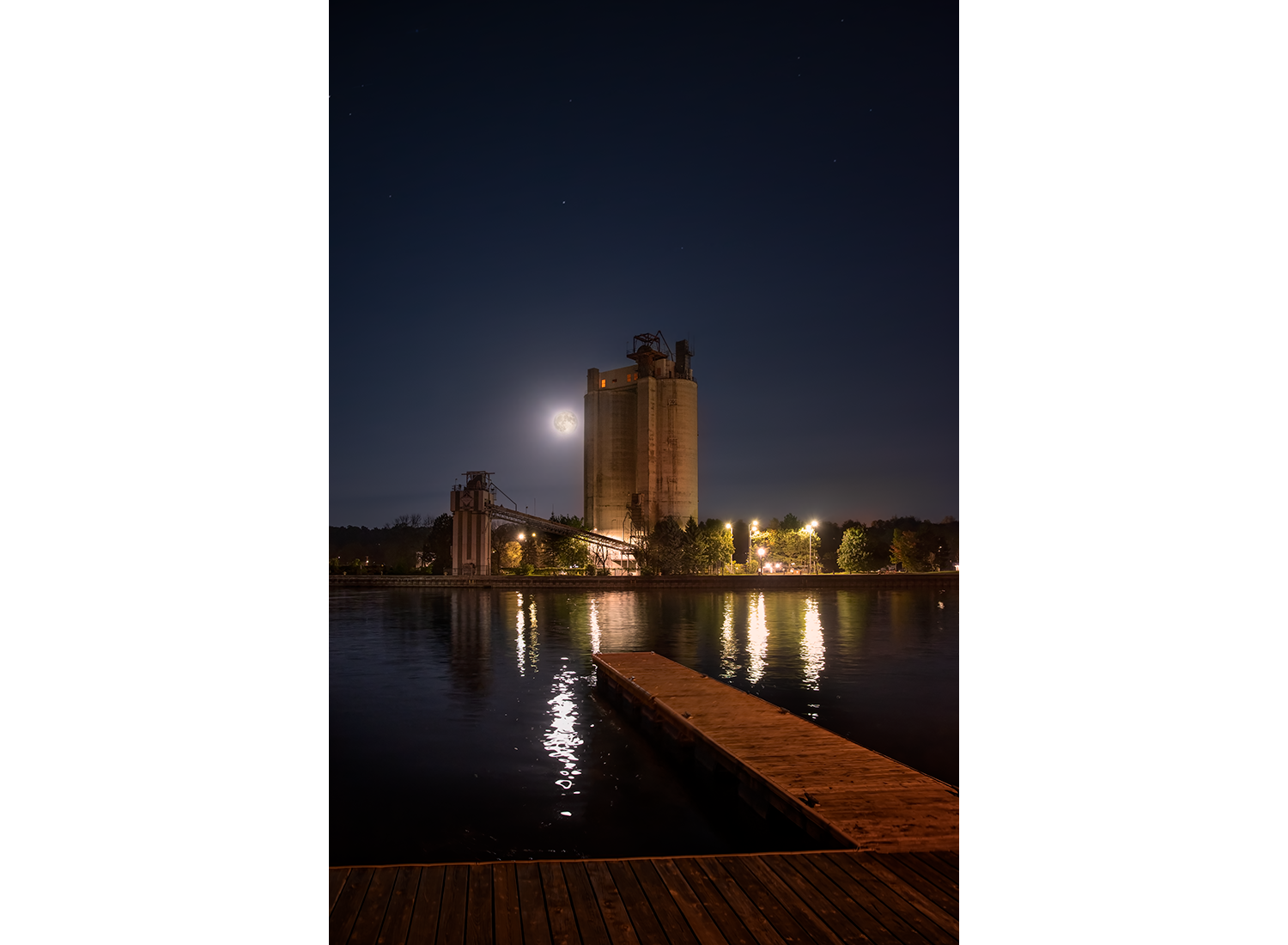 Fun moon rising over silos © Irwin Seidman