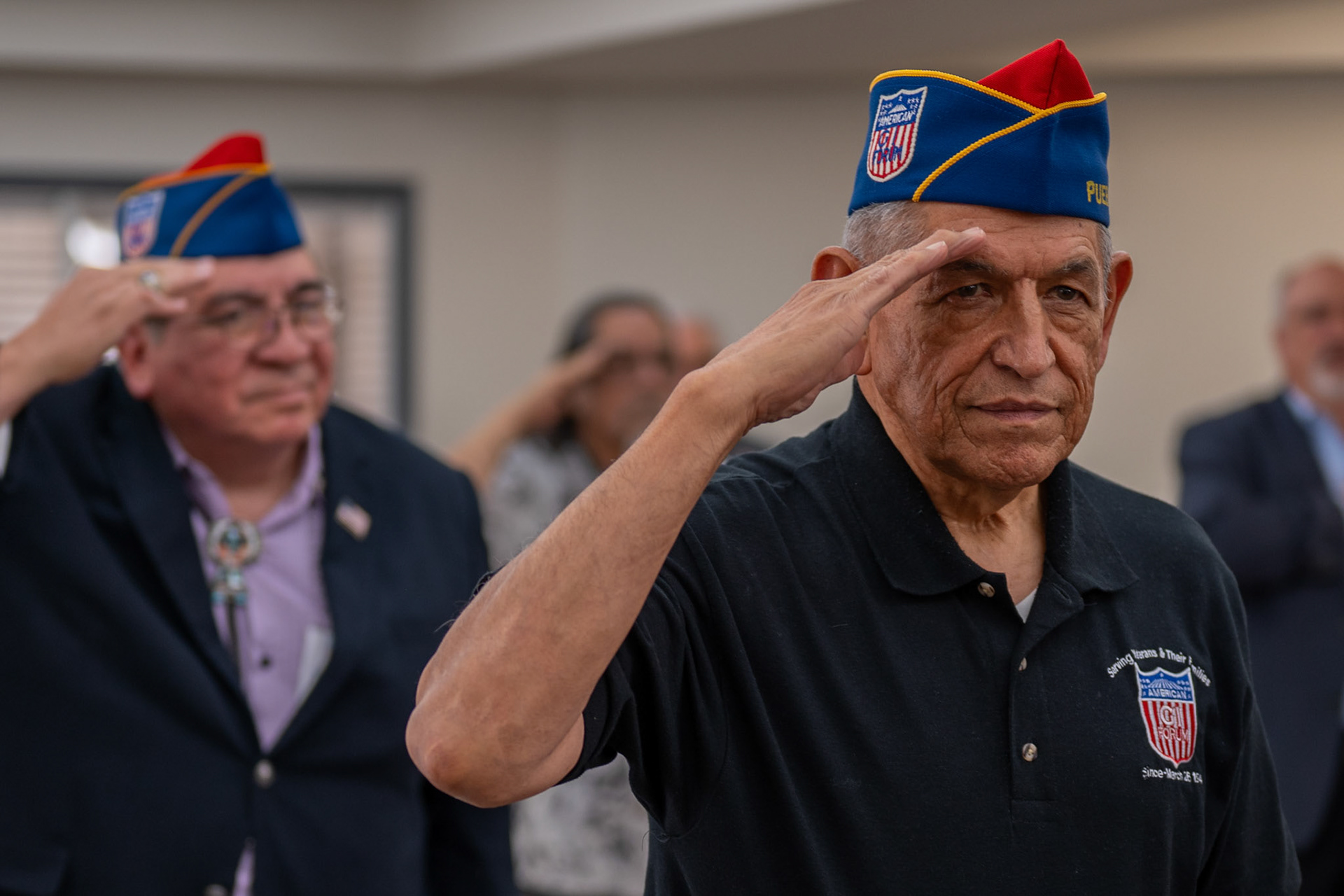 American GI Forum National Treasurer Ted Lopez salutes during the national anthem at the Valor Hill Apartments ribbon-cutting ceremony Tuesday, July 29, 2025.American GI Forum National Treasurer Ted Lopez salutes during the national anthem at the Valor Hill Apartments ribbon-cutting ceremony Tuesday, July 29, 2025.