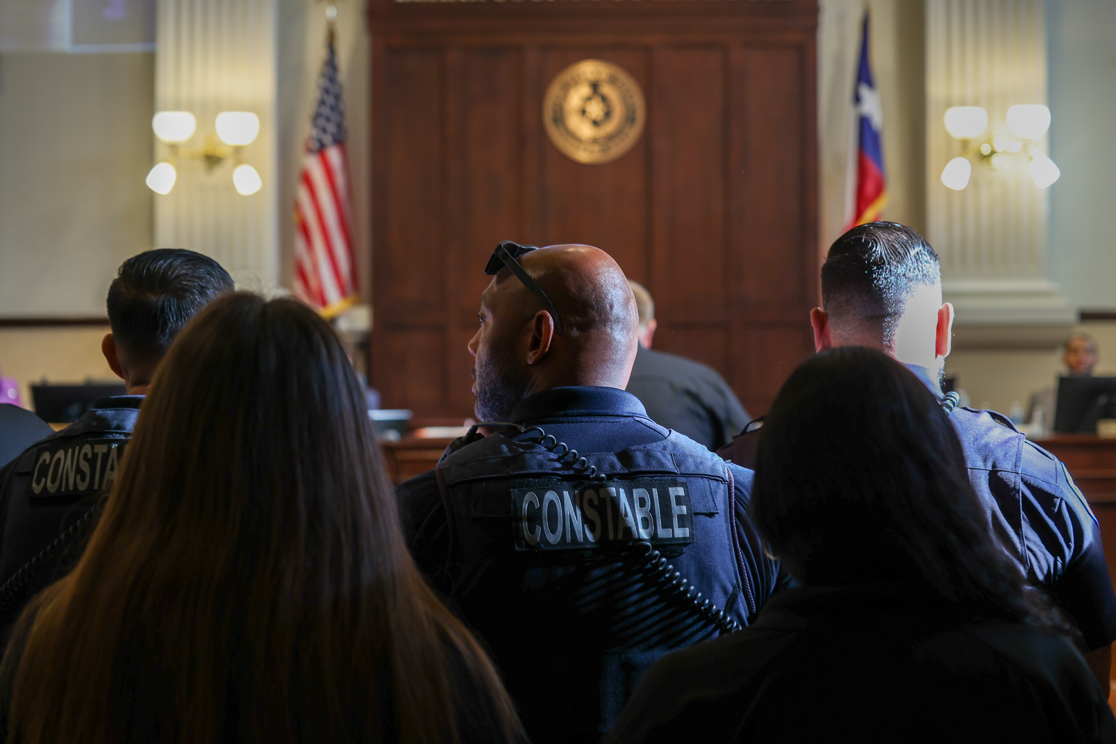 First responders to the July 4 flash floods in Kerr County line up to be recognized by Bexar County Commissioners Court on Sept. 9, 2025, at the Bexar County Courthouse.