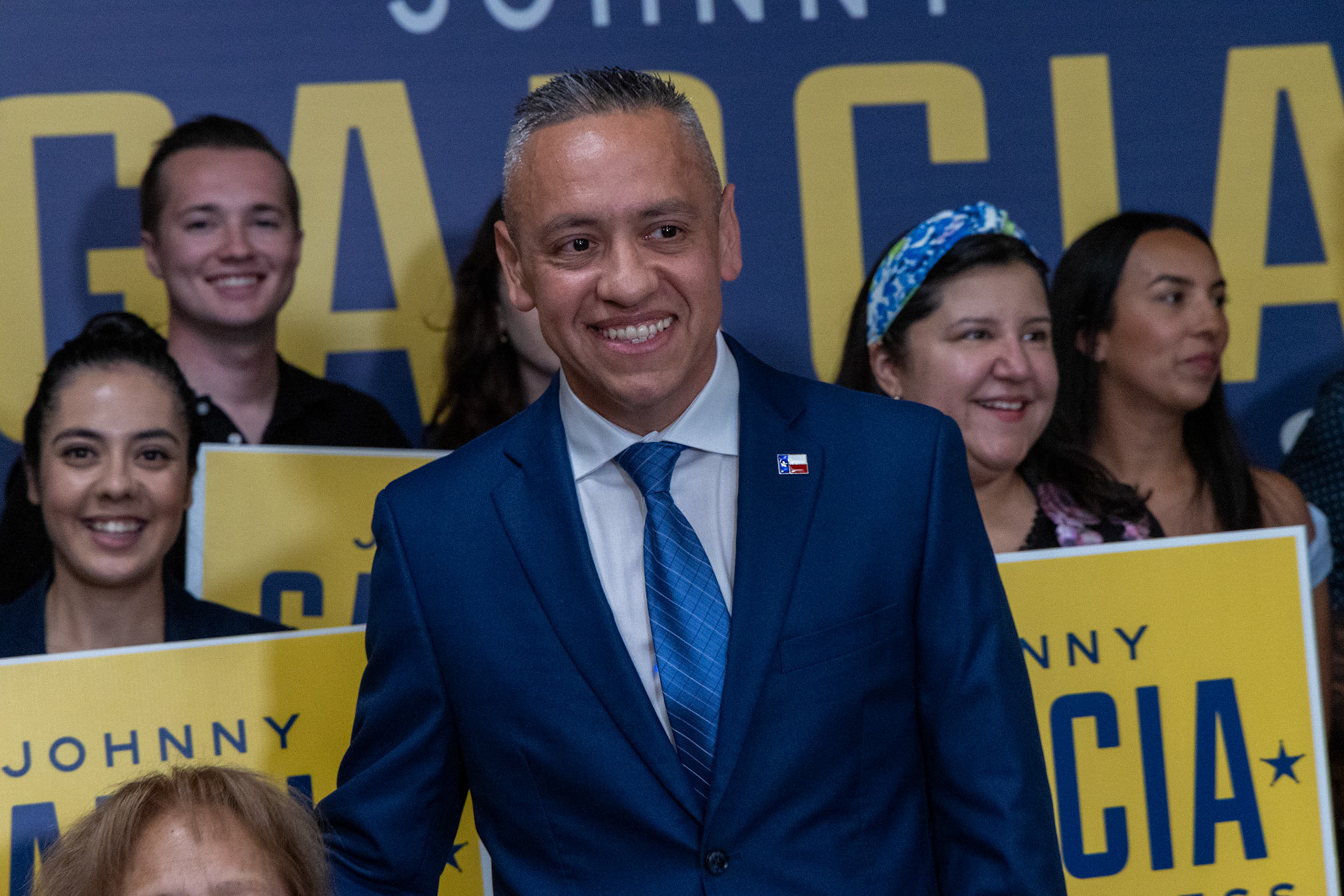Bexar County Sheriff Departments Public Information Officer Johnny Garcia poses for photos with friends and family at his event where he announced plans to run for the new Texas' 35 congressional district at a community event on the south side on Oct. 9, 2025.