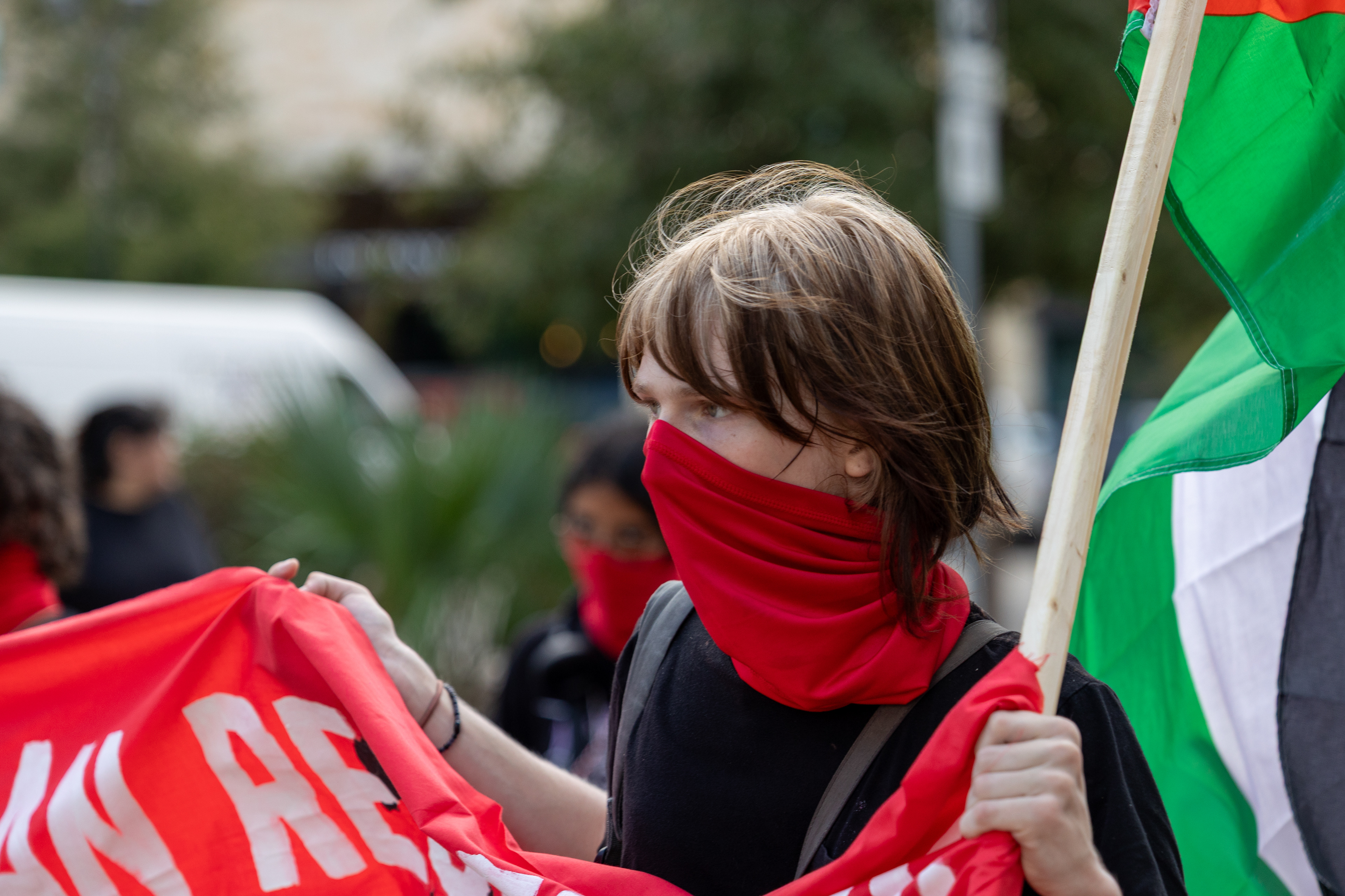 A Fox Tech High School student marches with the Fox Student League during a walkout protest in San Antonio on Oct. 7, 2025.