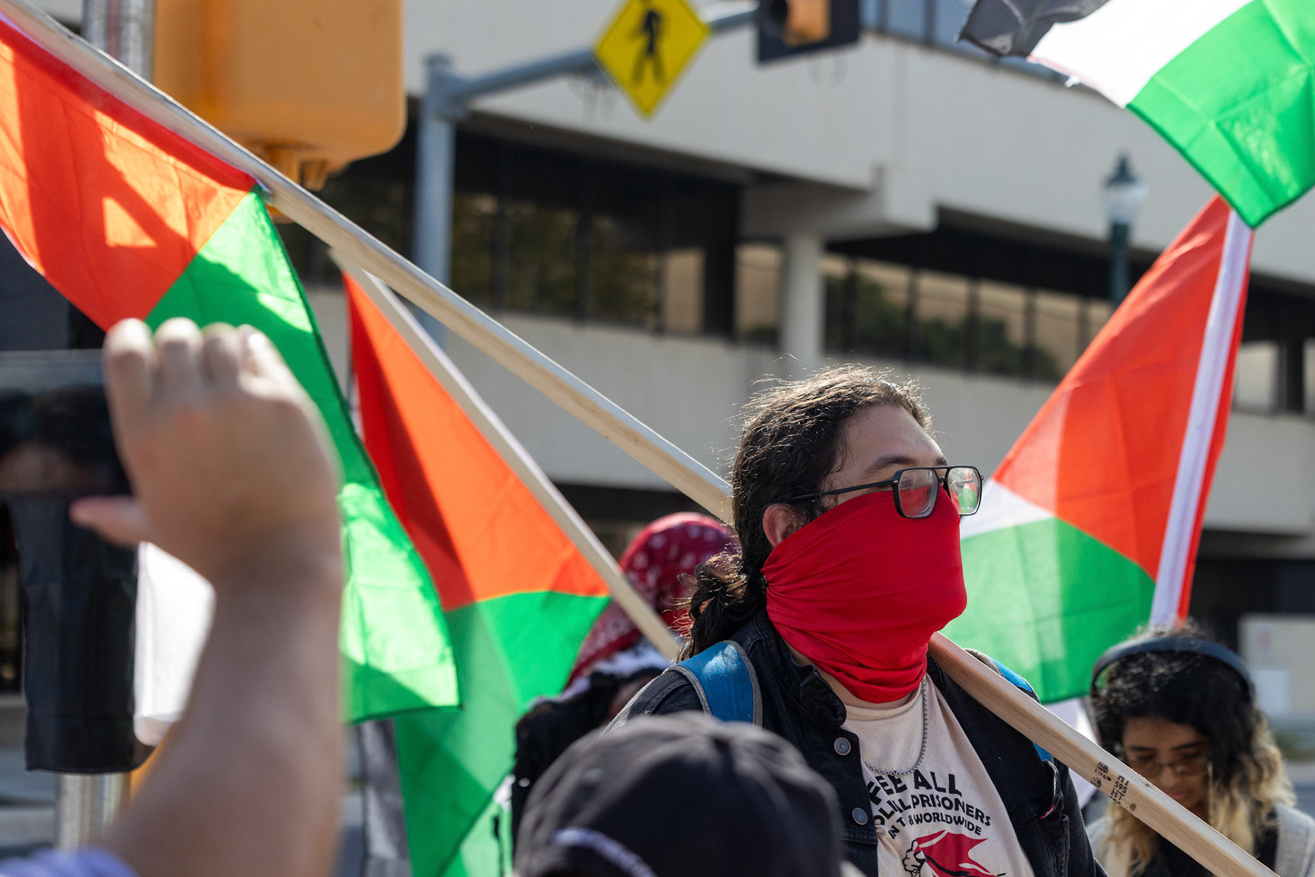 A member of the Fox Tech Student League, who requested to remain anonymous, speaks to the press outside Fox Tech High School during a planned walkout protest on Oct. 7, 2025, in San Antonio.