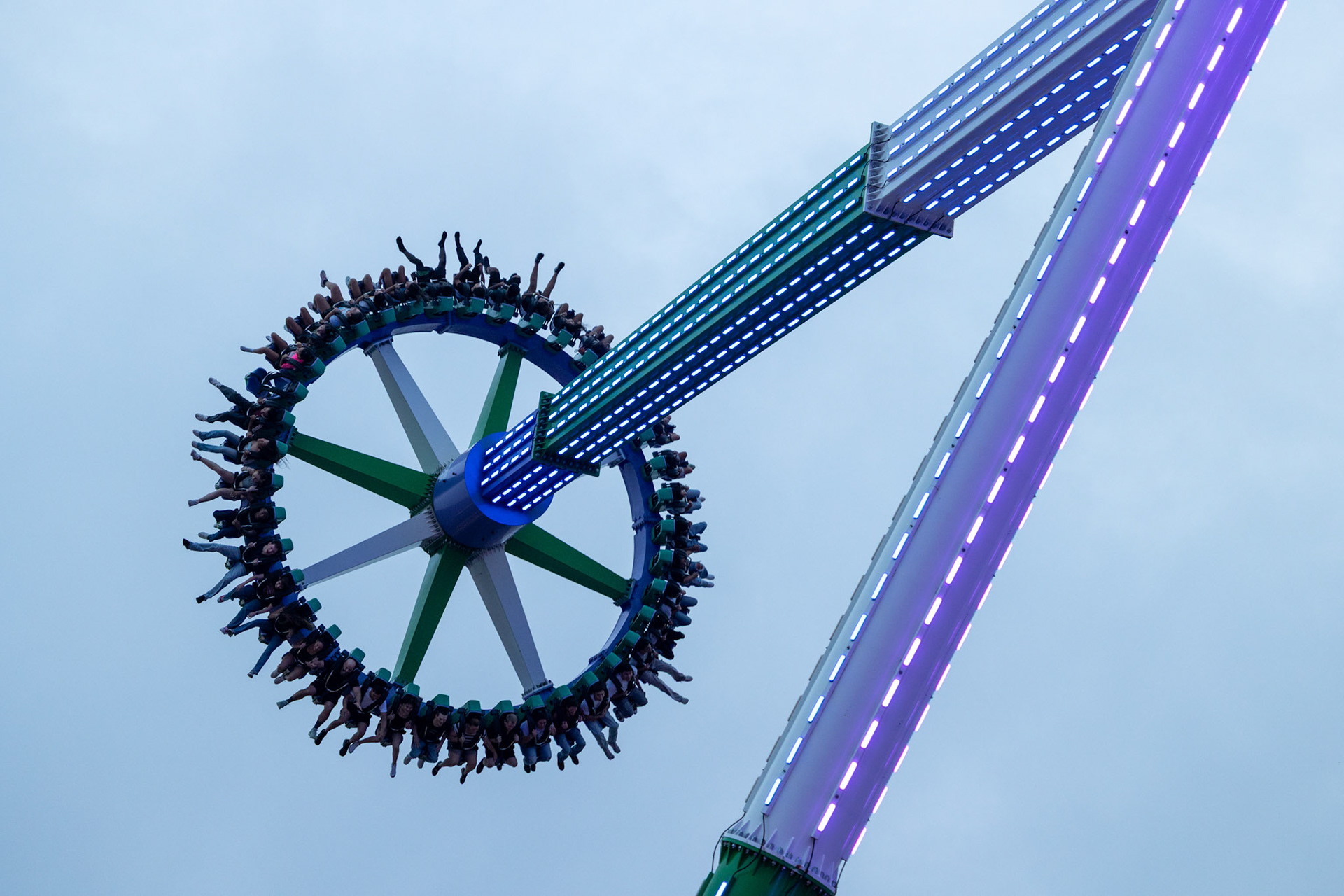 Parkgoers ride the Joker: Carnival of Chaos pendulum ride at Six Flags Fiesta Texas in San Antonio on Sept. 6, 2025.