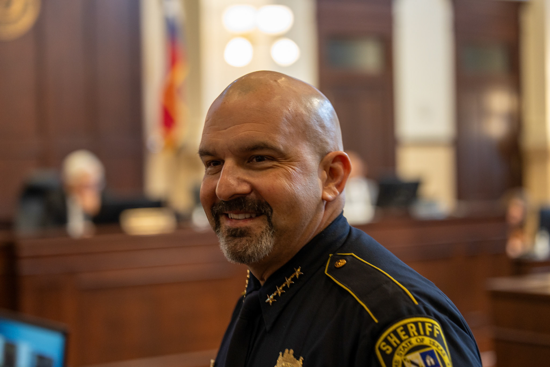 Bexar County Sheriff Javier Salazar smiles at the Bexar County Courthouse for a county budget work session on Tuesday, Aug. 26
