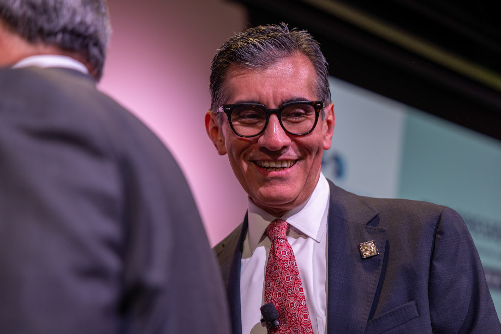 Alamo Colleges District Chancellor Mike Flores mingles at the Presidents Panel on Sept. 9, 2025, in San Antonio.