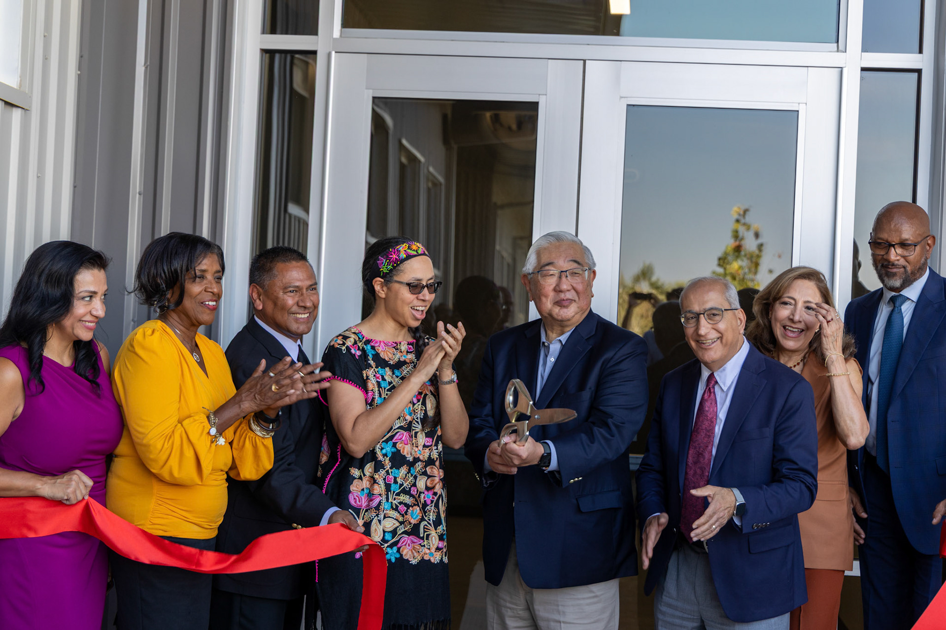 County Judge Peter Sakai and Precinct 1 Commissioner Rebeca Clay-Flores cut the ribbon to mark the opening of the new expansion at the Applewhite Recovery Center on the South Side on Oct. 9, 2025, in San Antonio.
