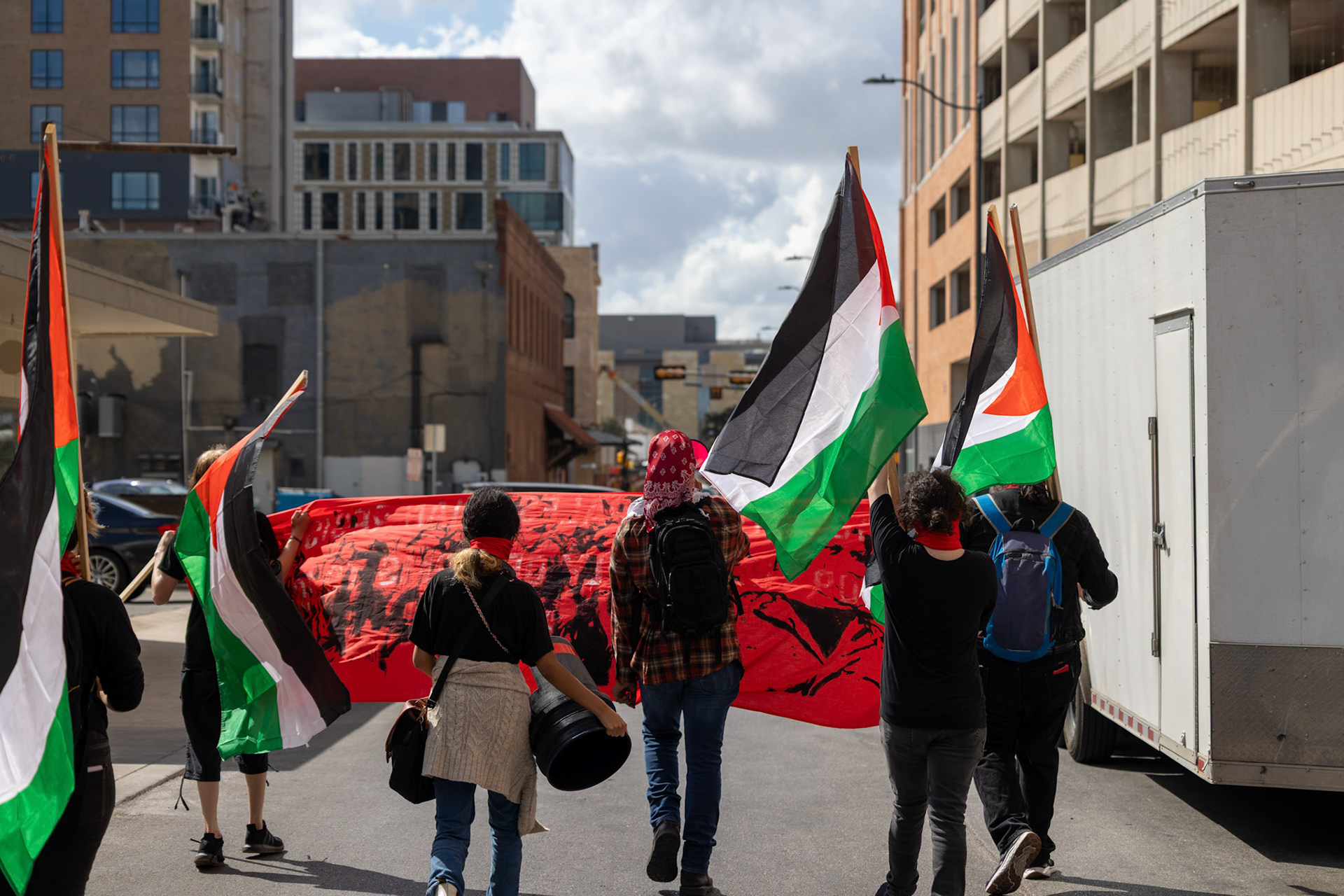 Members of the Fox Tech Student League march through downtown San Antonio during a planned walkout protest on Oct. 7, 2025.
