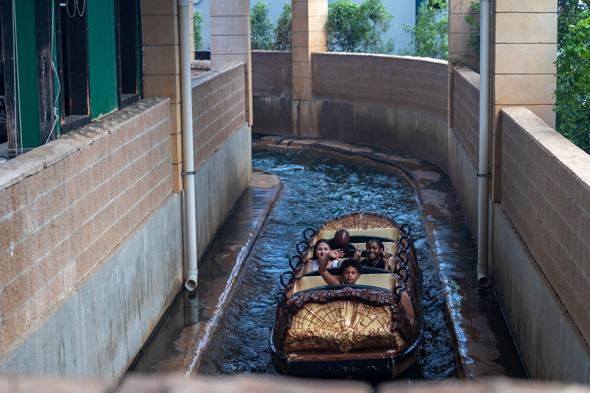 Parkgoers ride the Bugs’ White Water Rapids attraction at Six Flags Fiesta Texas in San Antonio on Sept. 6, 2025.