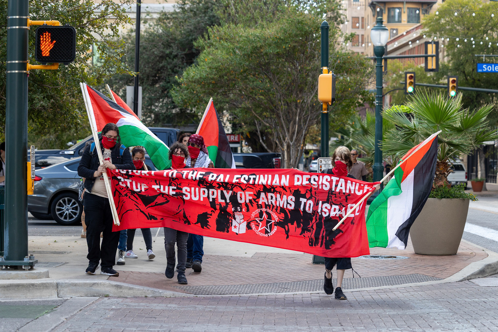 Members of the Fox Tech Student League march through downtown San Antonio during a planned walkout protest on Oct. 7, 2025.