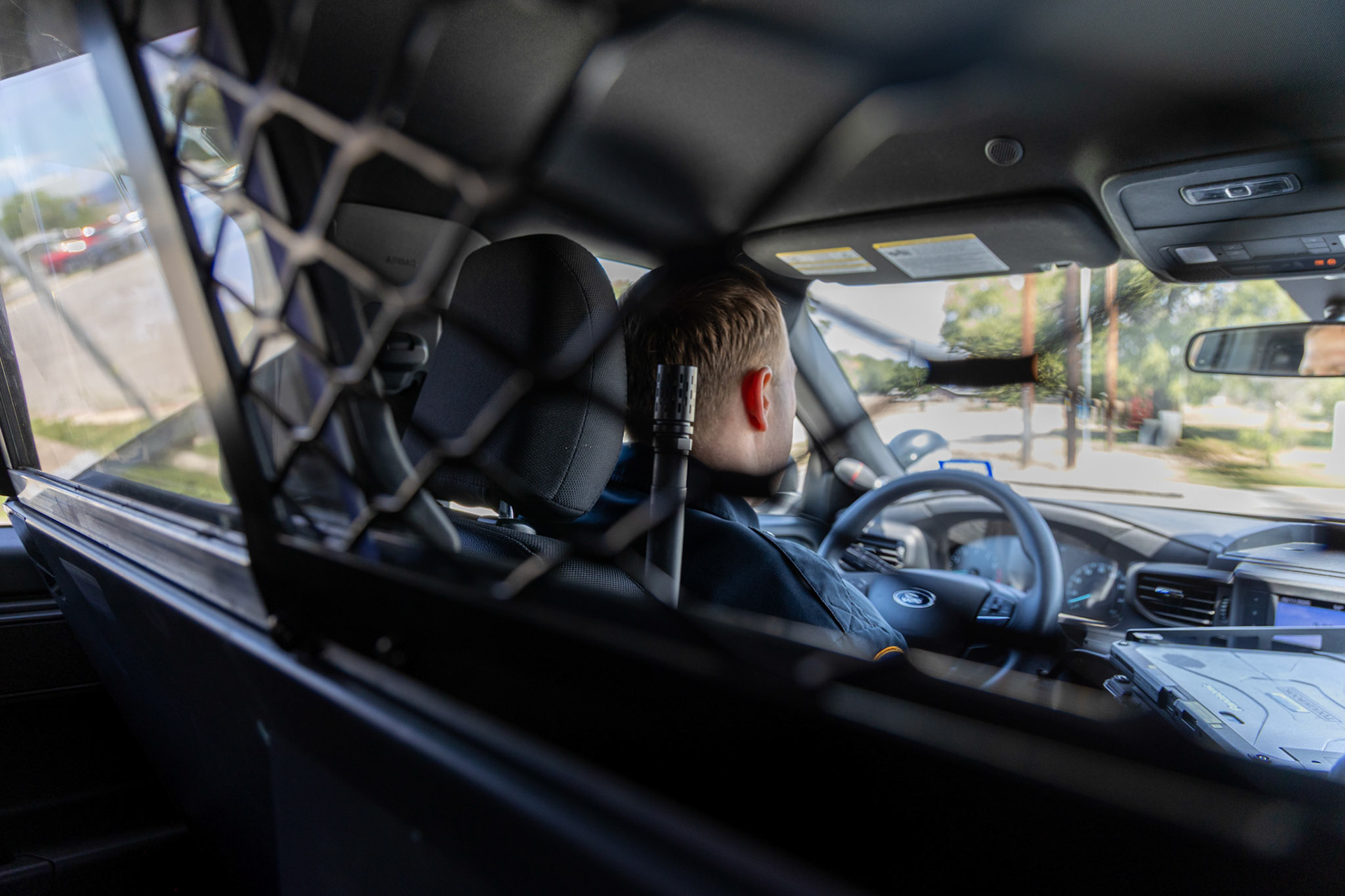 San Antonio Independent School District Police Department Sgt. Joshua Bodenbach patrols in his vehicle on Sept. 11, 2025.