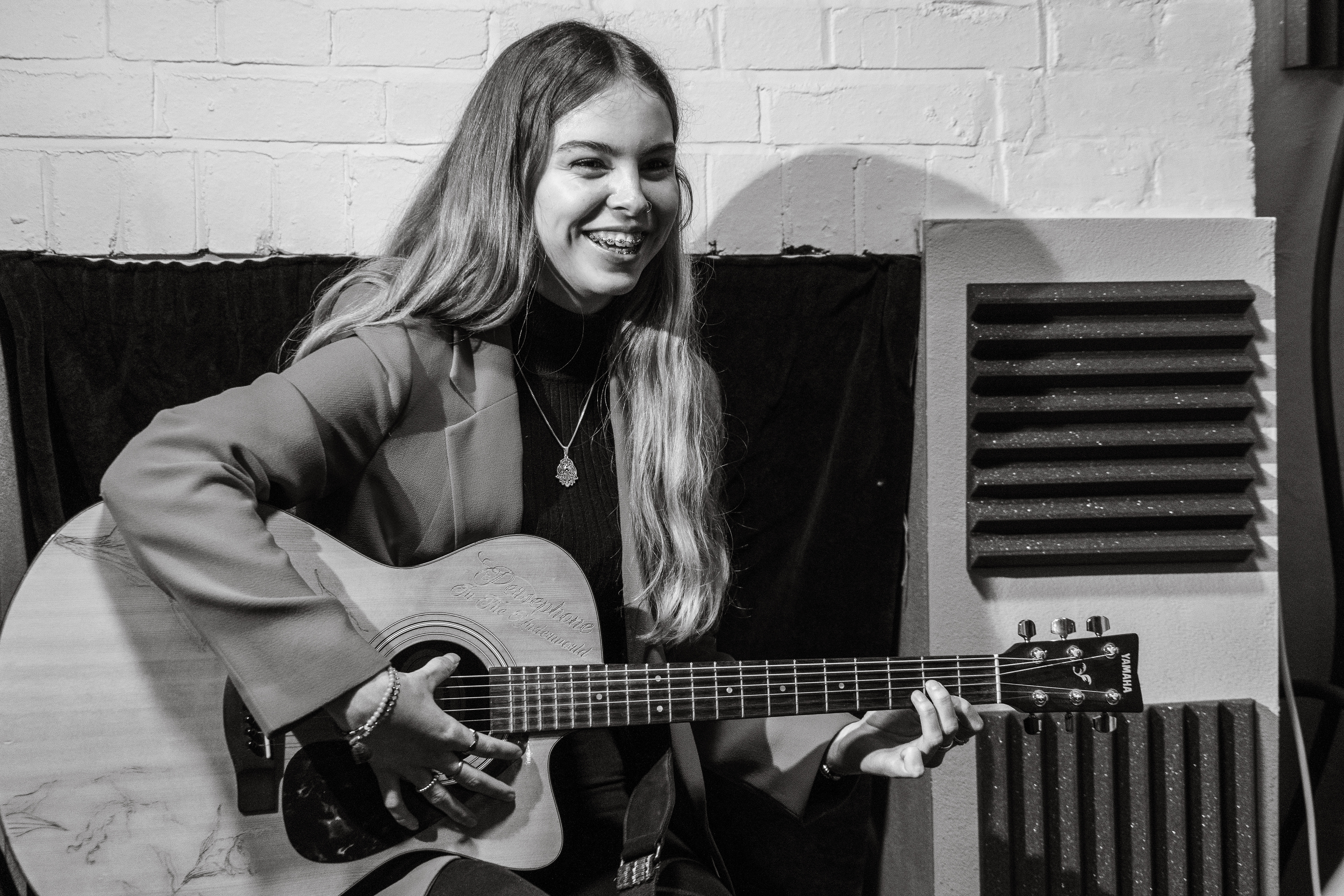 Maggie learns guitar!