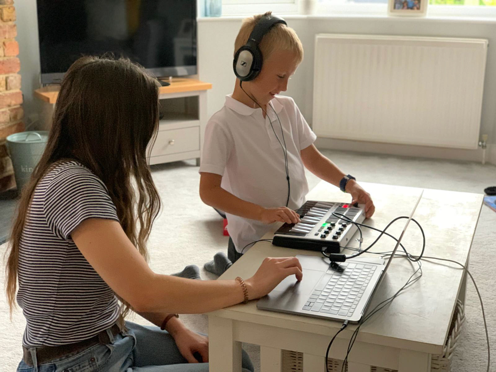 Persephone (Tutor) and Will, 7 (Student) learning to record using Garageband