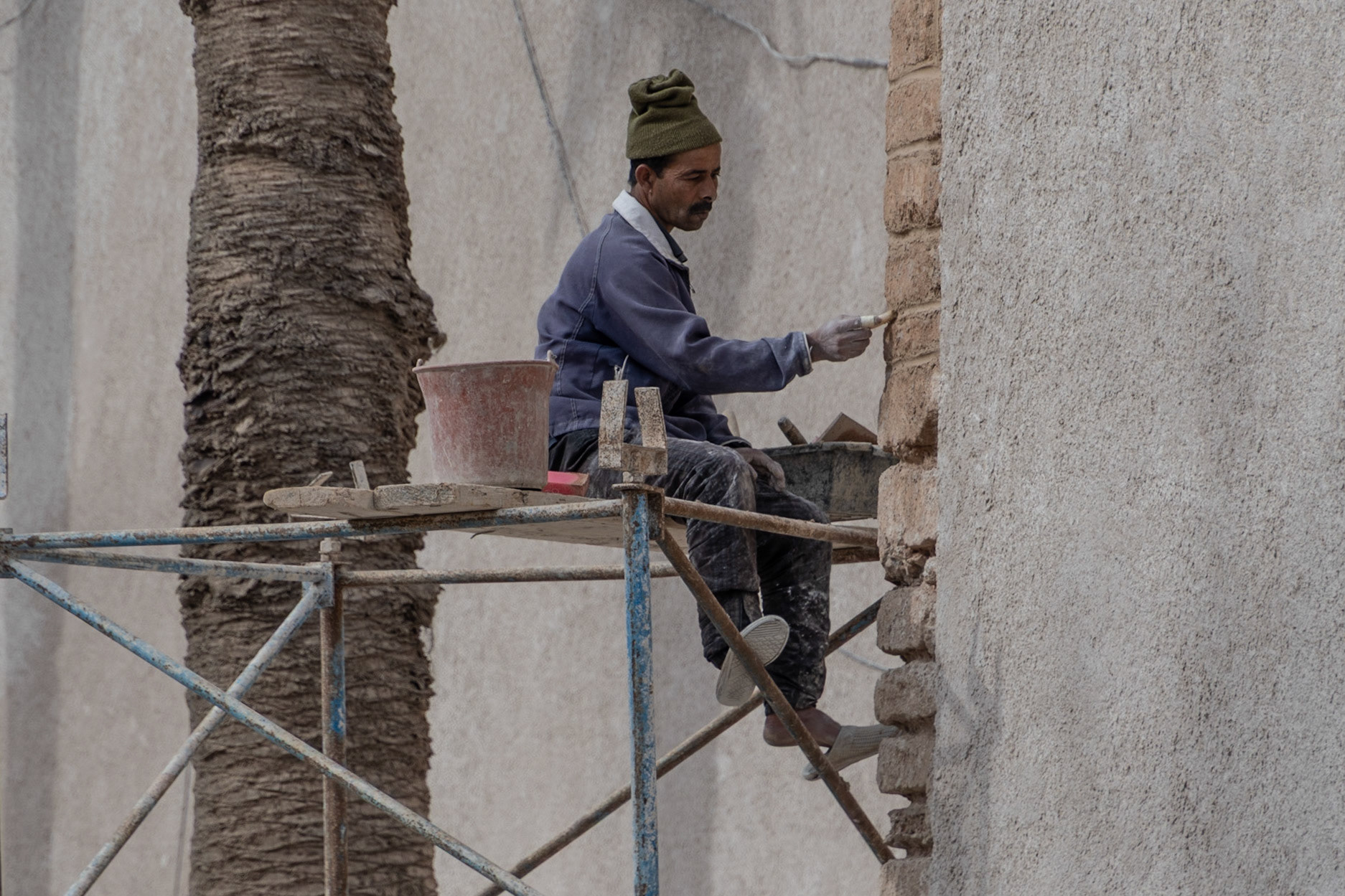 Repairing the town walls, Essaouira, Morocco